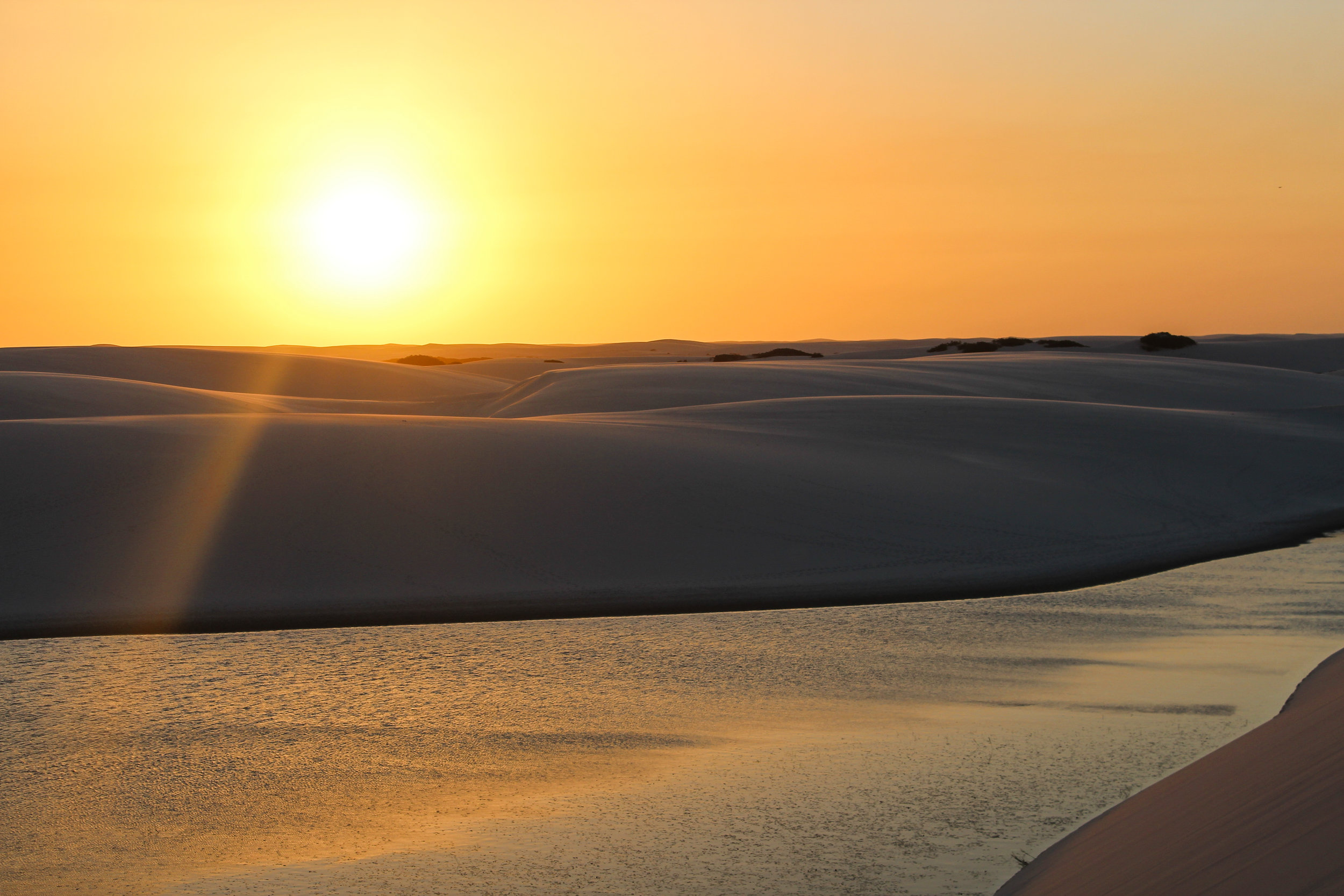 The sun comes down on the dunes at Lençois Maranheses