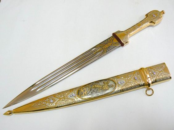 The hilt features pearl studs and macguffin inlay.
