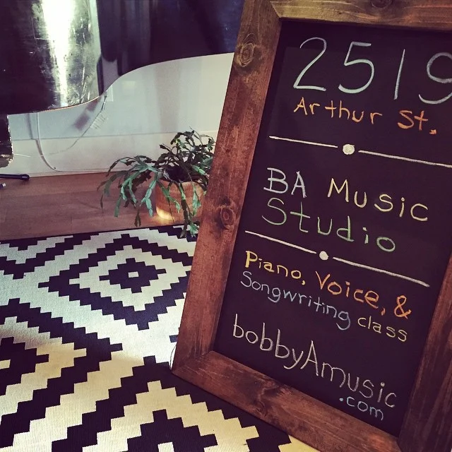 chalk-aframe-sign-inside-rug.jpg