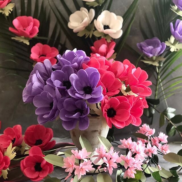 Paper anemones and jasmine branches. These are a blast to make. Another antidote to boredom&mdash;making a lei for Henri out of old carnations. He wasn&rsquo;t too keen on this but Cheerios helped with his participation! 💕 #paperflowers #frenchiesof