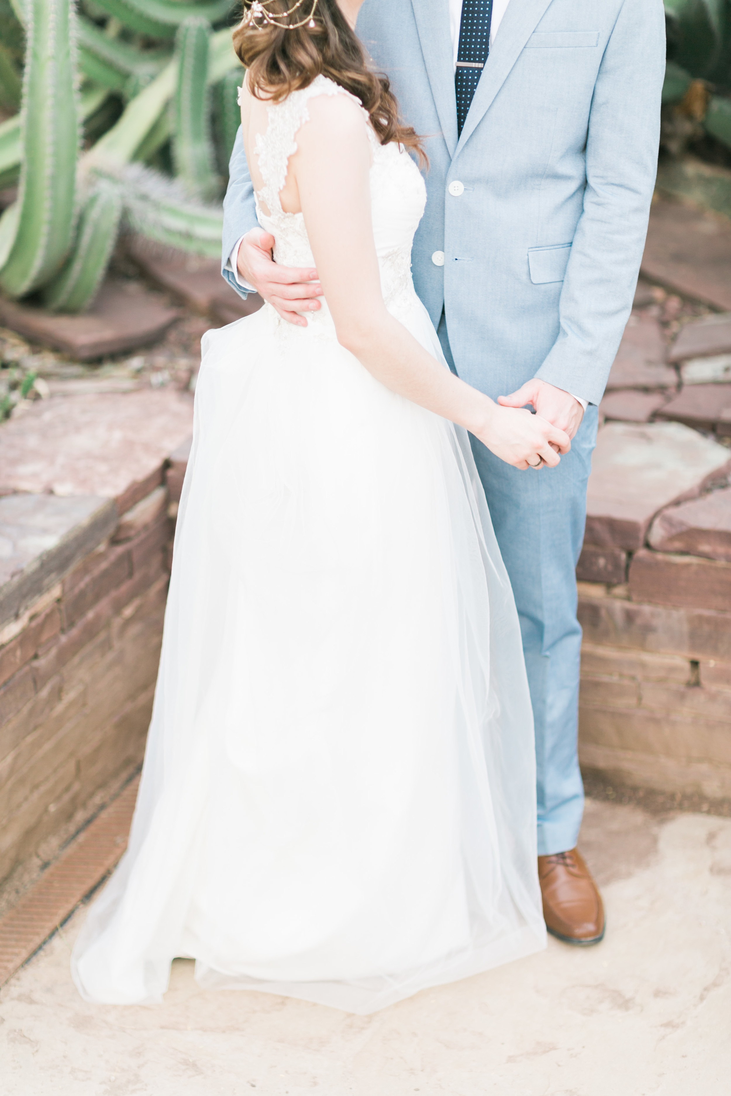 holding hands in the cactus garden