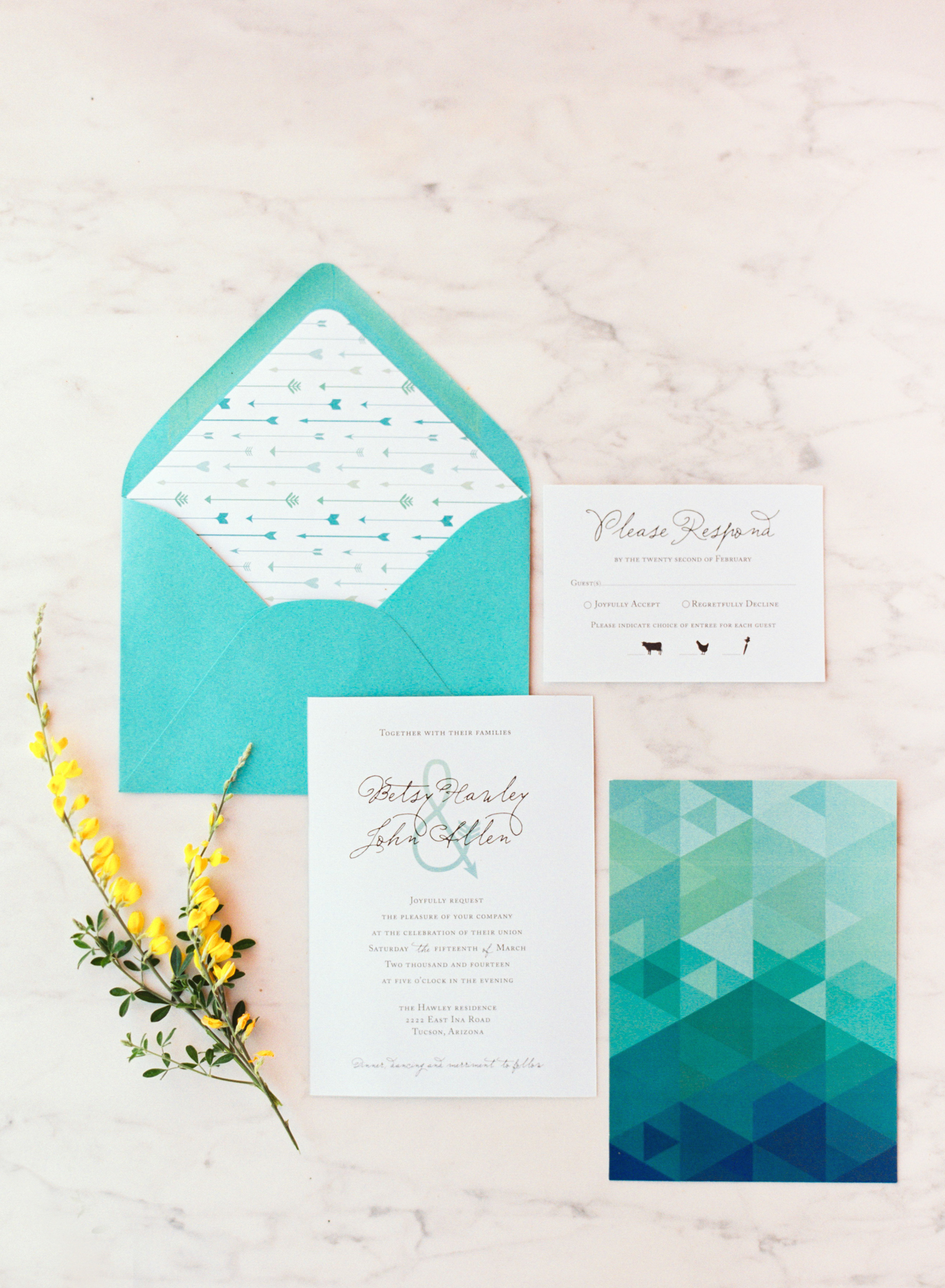 Teal wedding invitations designed by Betsy and John