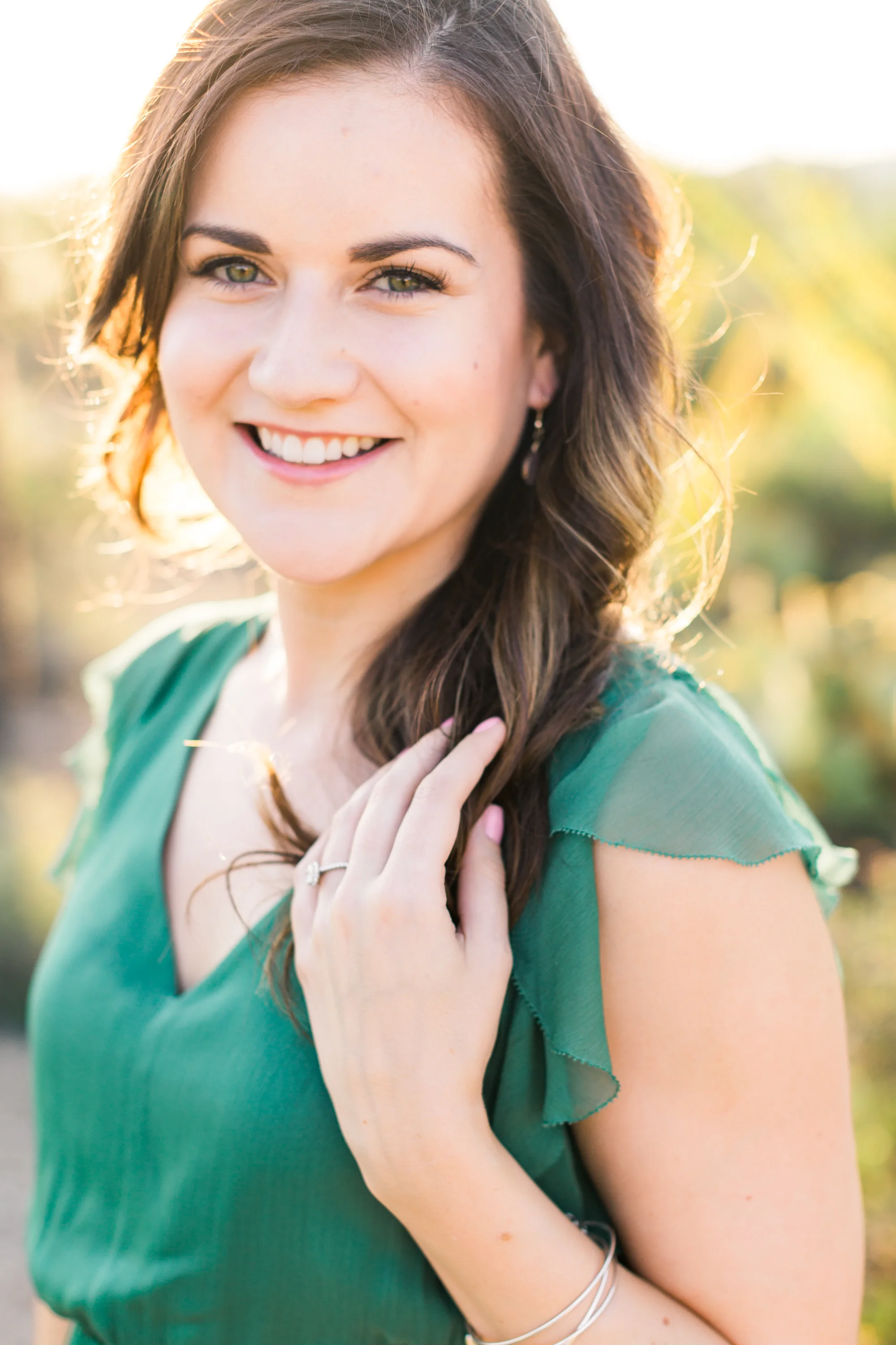 Beautiful bride to be smiling at her Tucson engagement photos with Betsy & John.