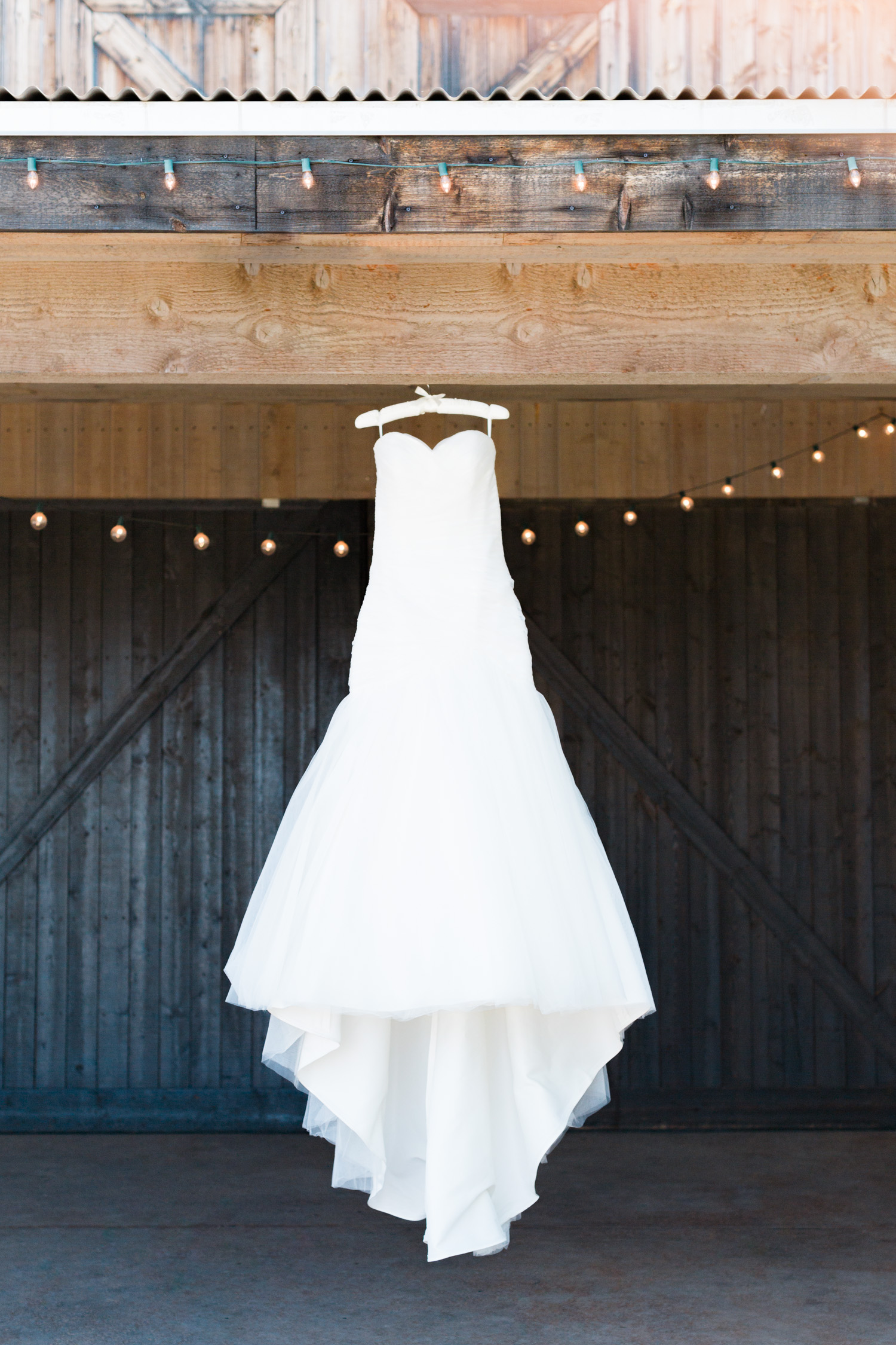 Hannah's sweetheart neckline, strapless dress hanging on display at Stardance.