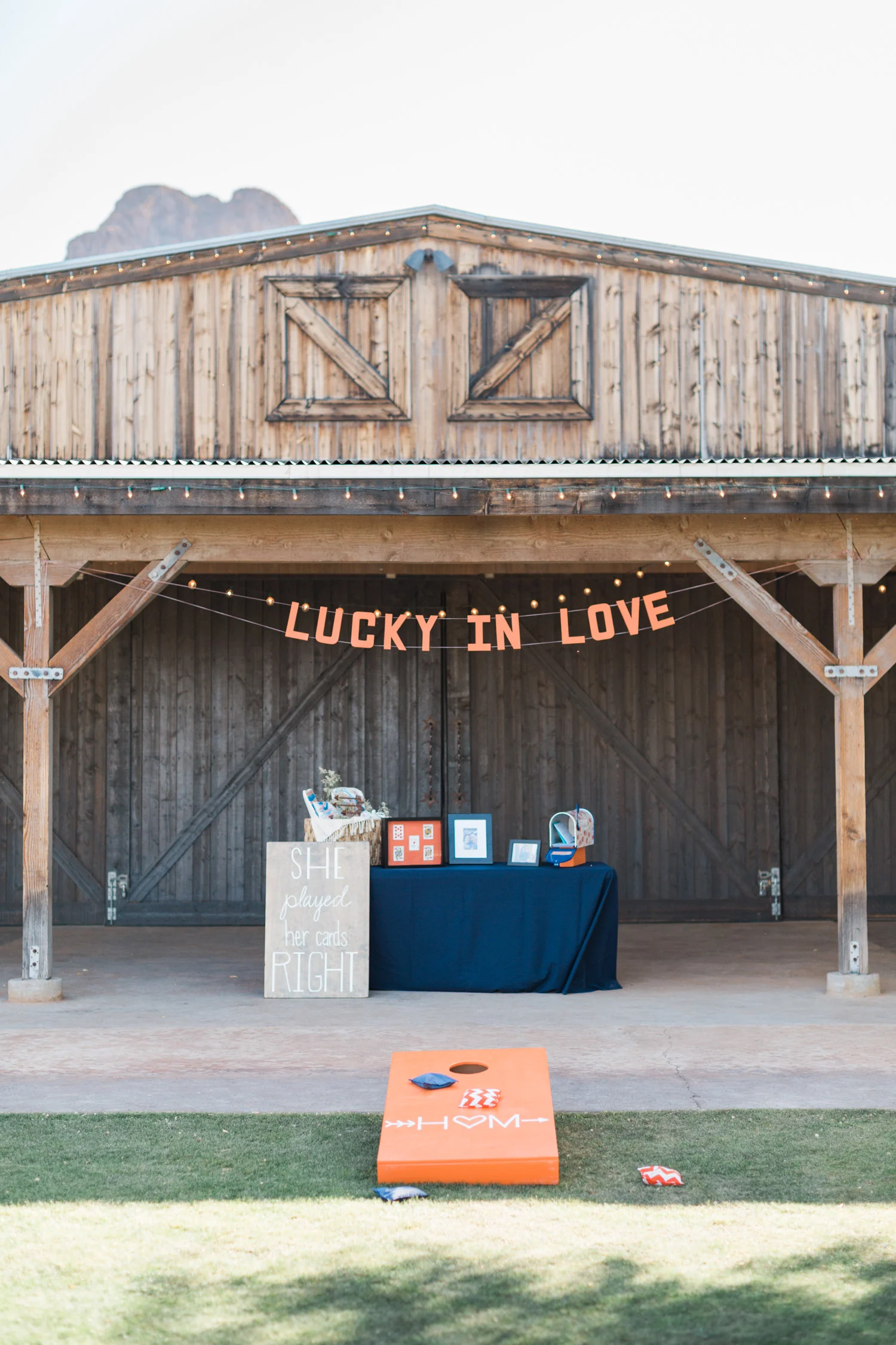 Tucson barn wedding venue, Stardance, all set up for the cocktail hour, complete with custom cornhole game! 