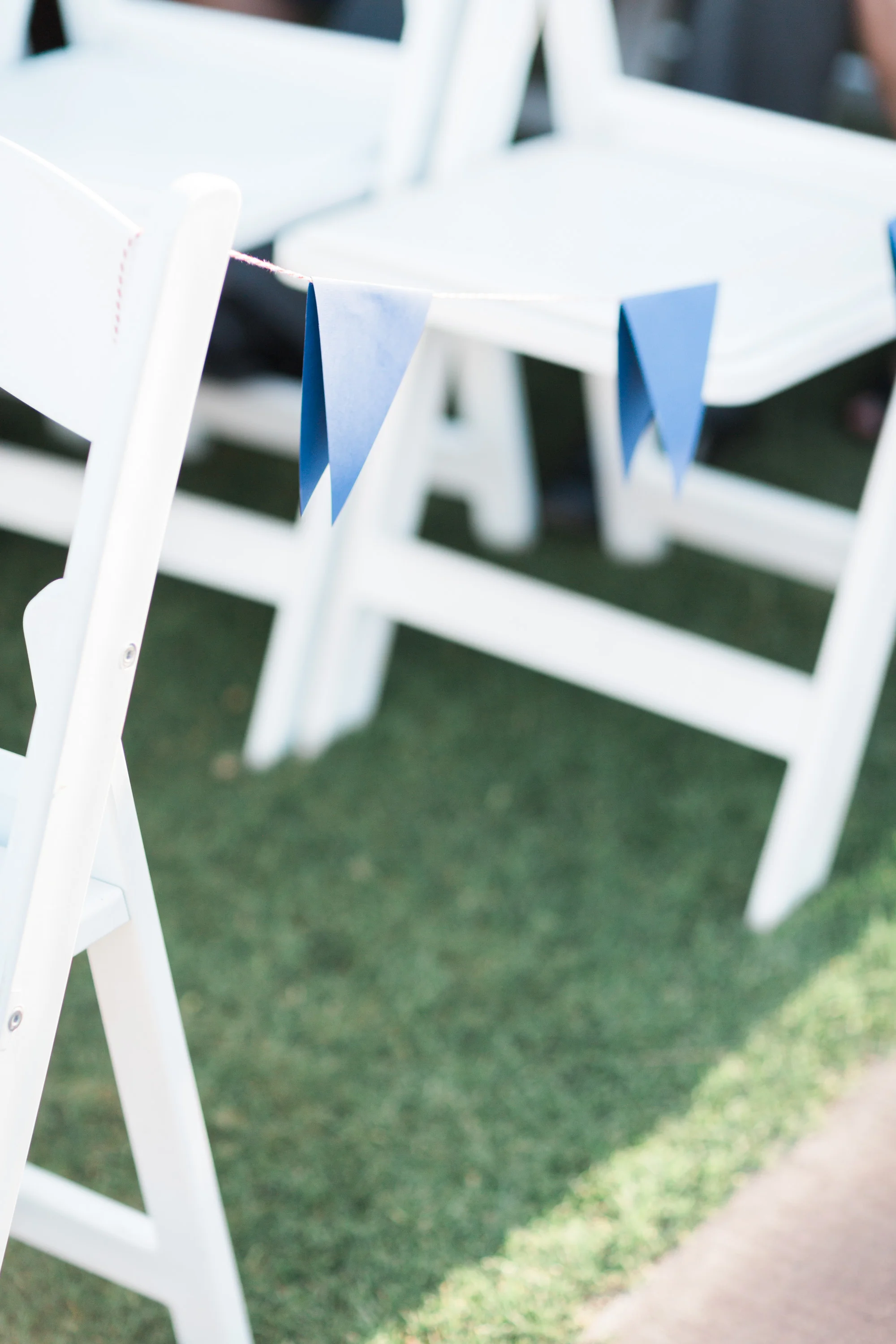Reserved seats, roped off with paper flags.