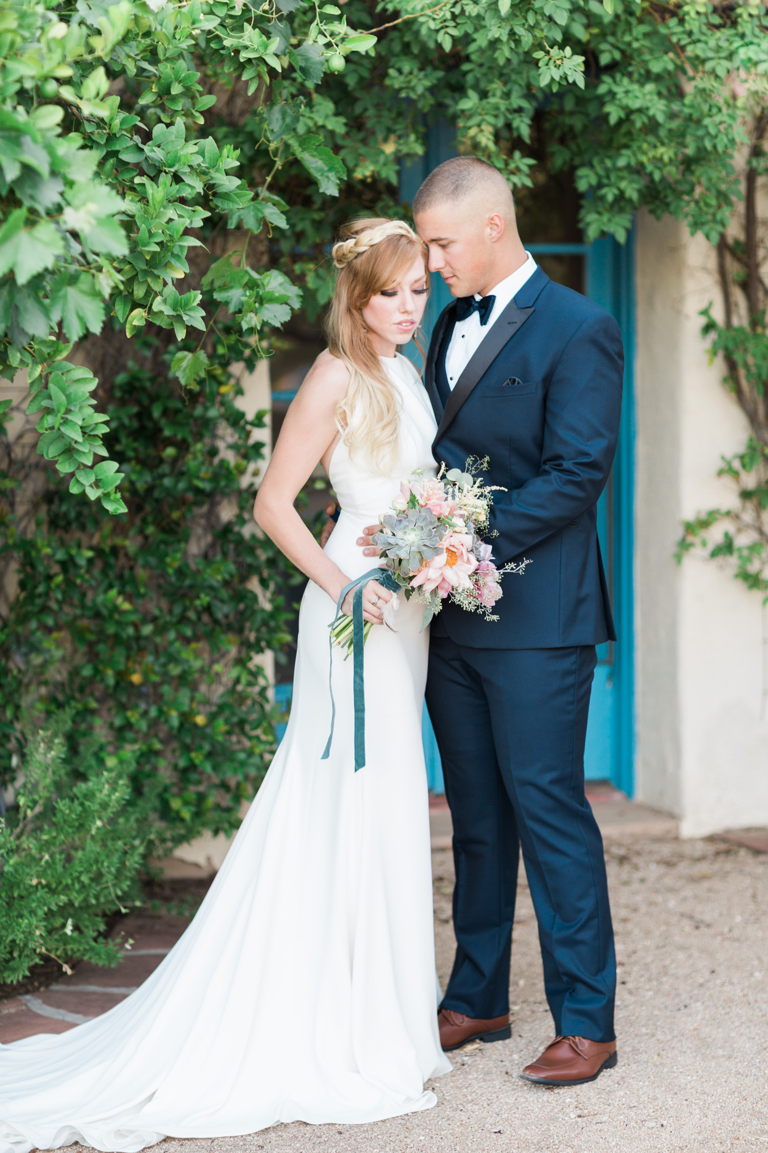 Couple embracing at Tohono Chul wedding in Tucson, Arizona