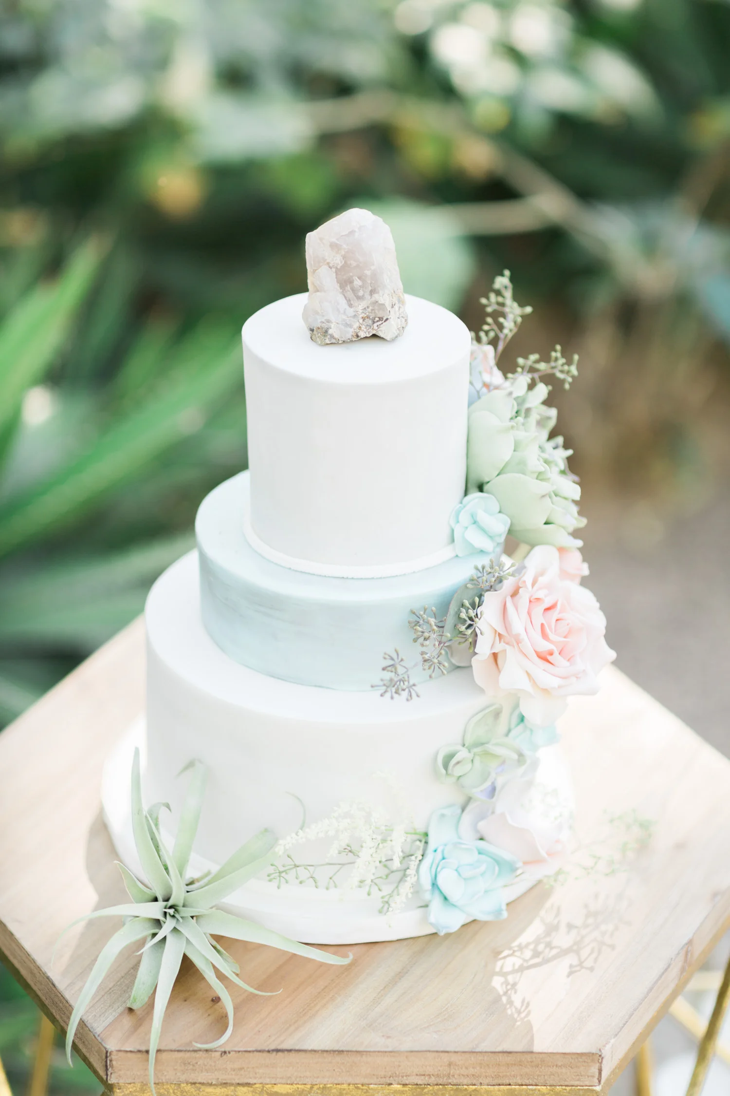 Beautiful three tiered cake by Crumbs Cake Boutique in Tucson. The best cake we've ever had! 