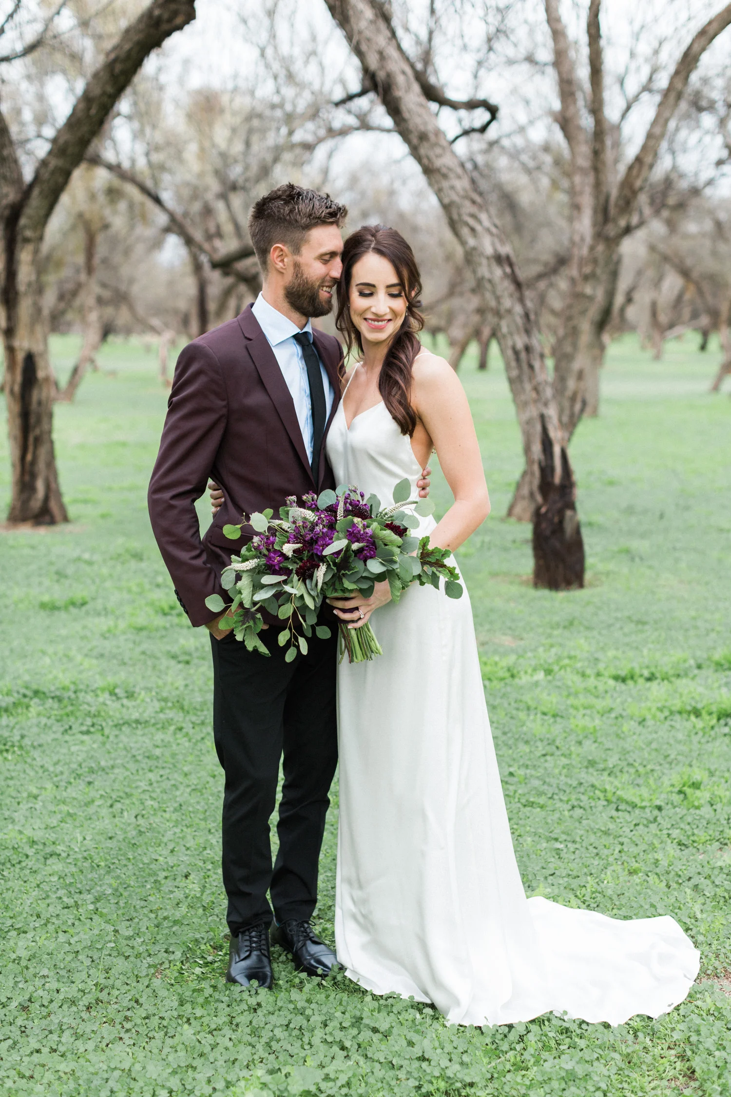 Groom hugging his new bride at their Phoenix bride and groom session, the day after they eloped! 