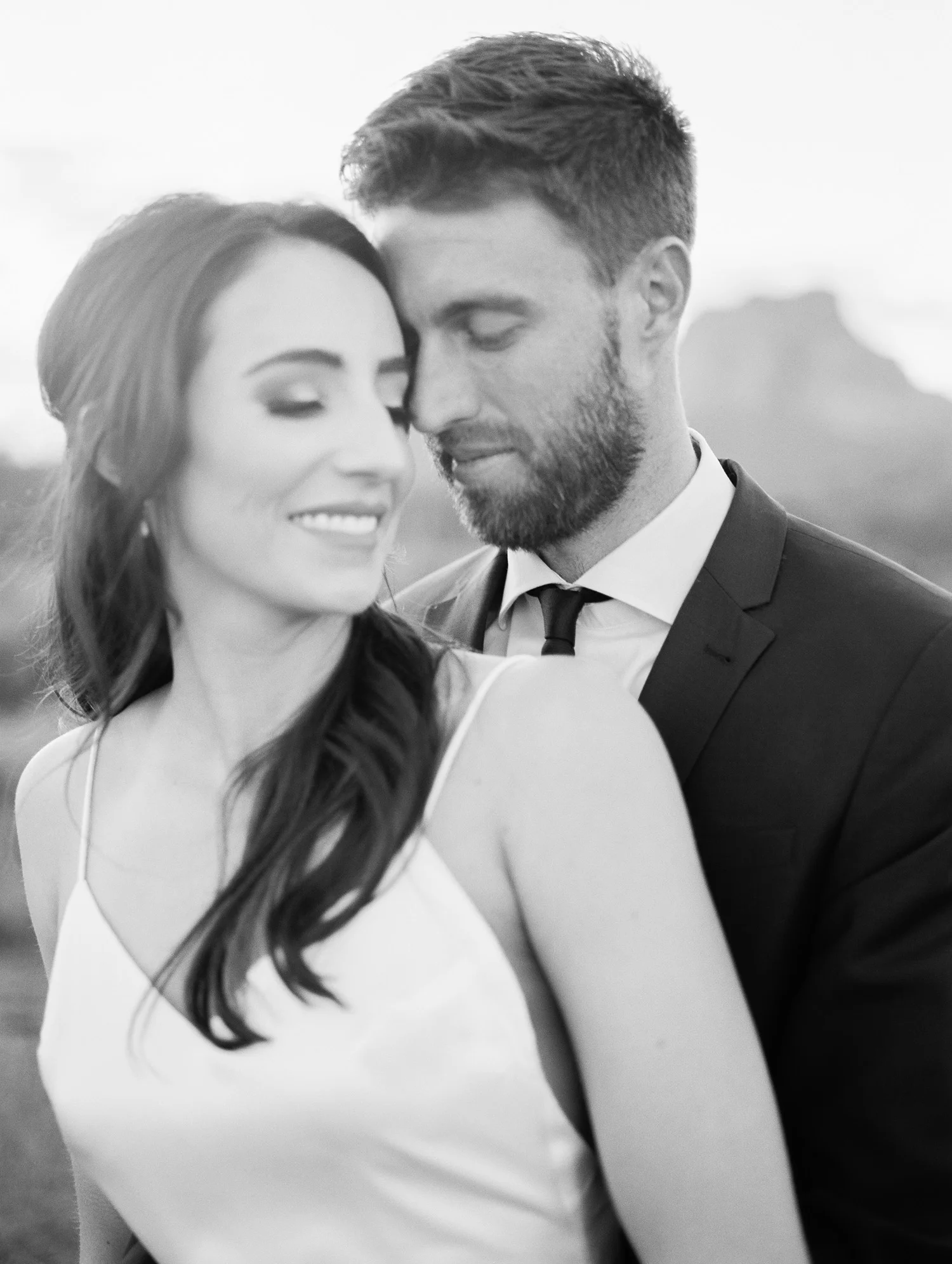 A romantic moment on their wedding day in Phoenix, Arizona.