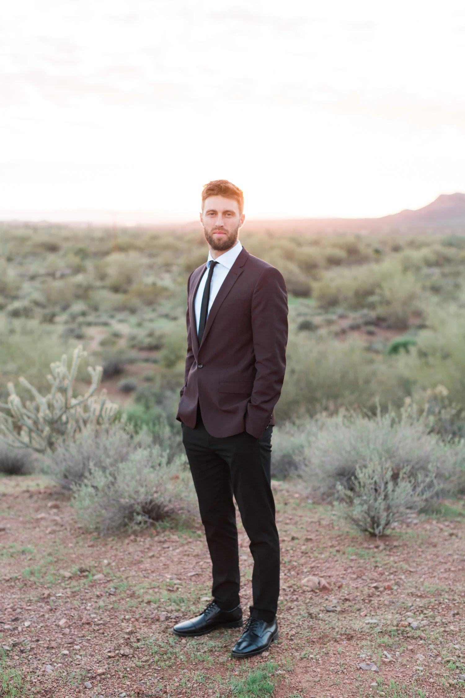Hip groom in the desert on his wedding day in Phoenix, AZ. 