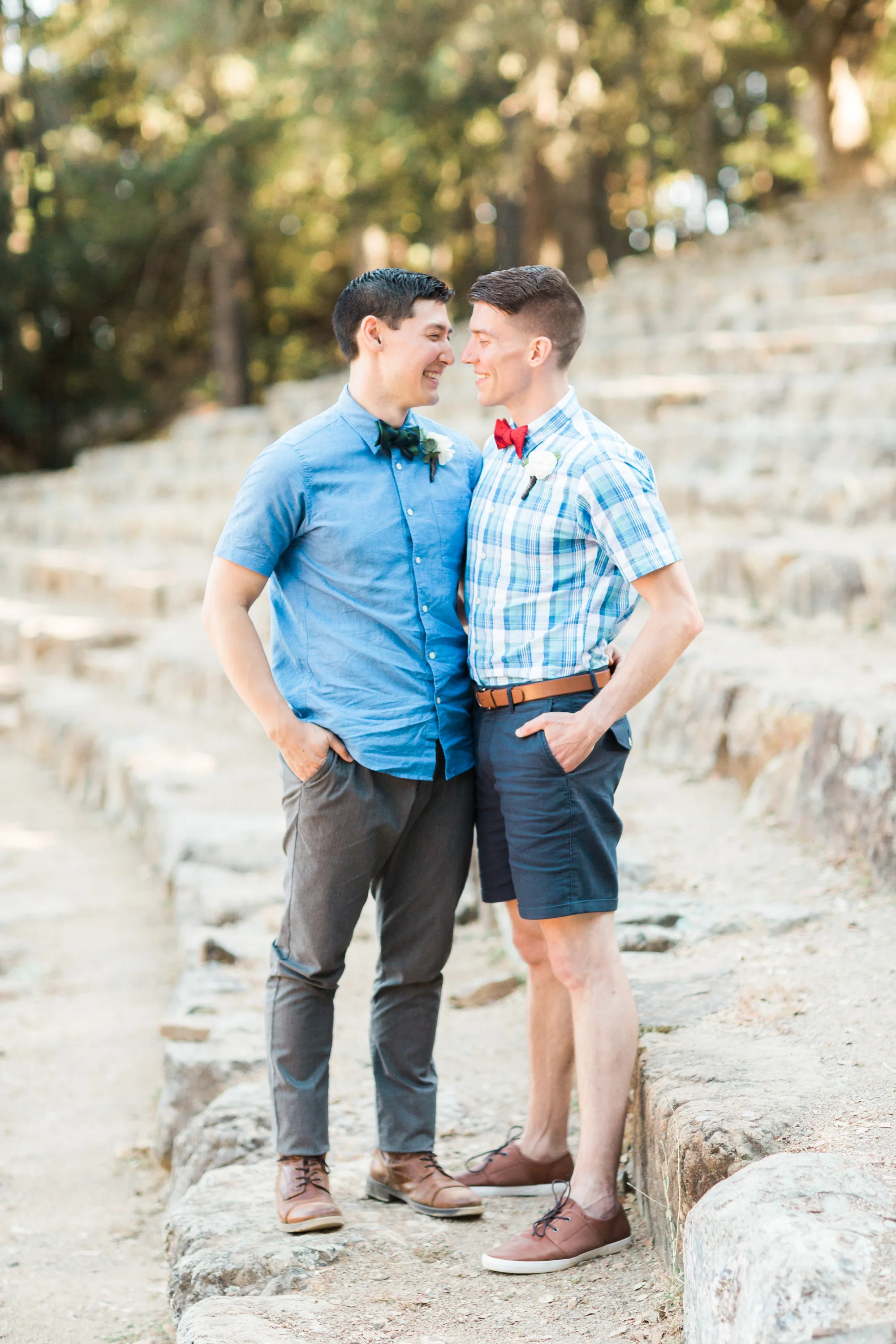 Two handsome grooms about to kiss on their wedding day at the Mt. Tamalpais amphitheater