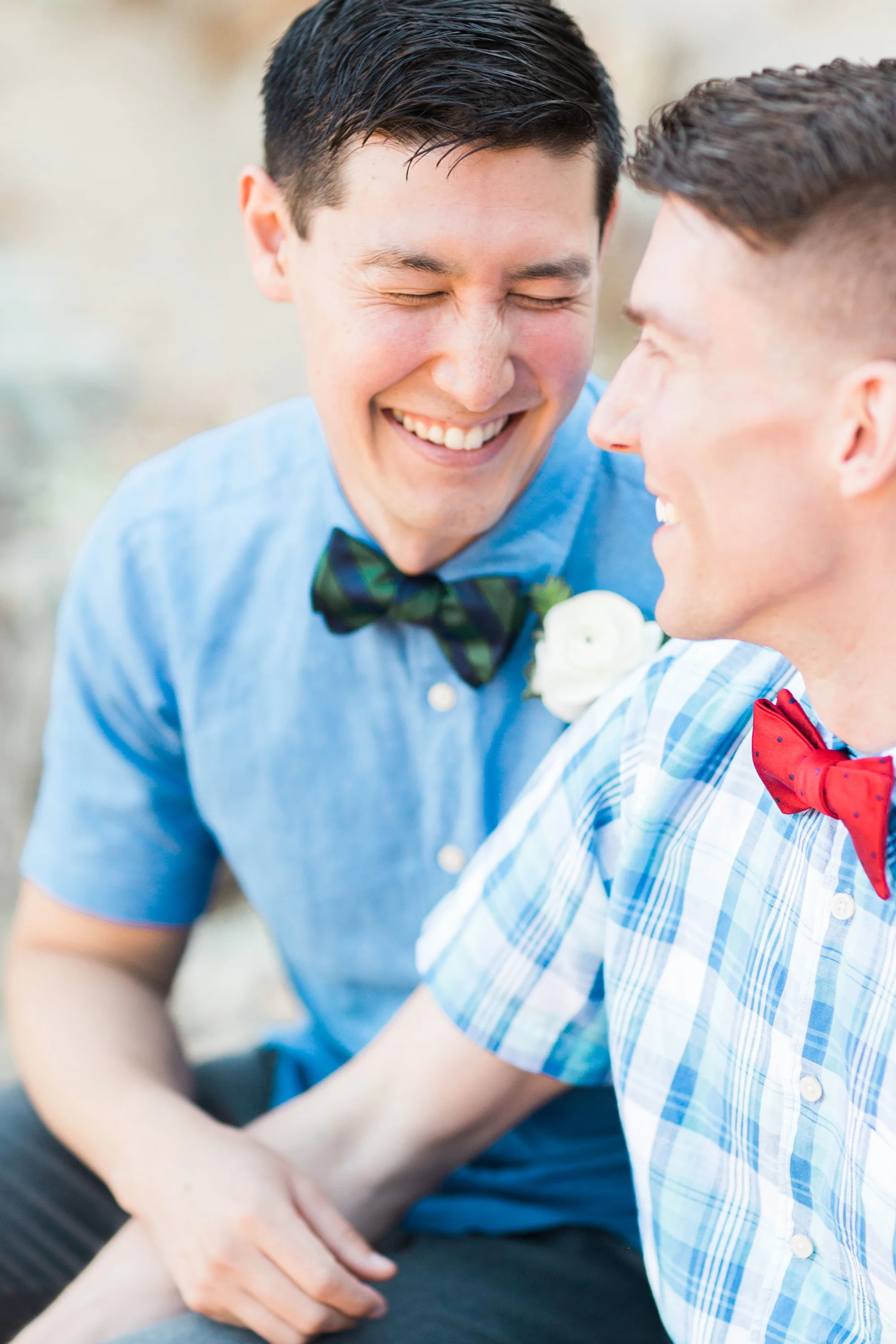 Groom laughing on his wedding day