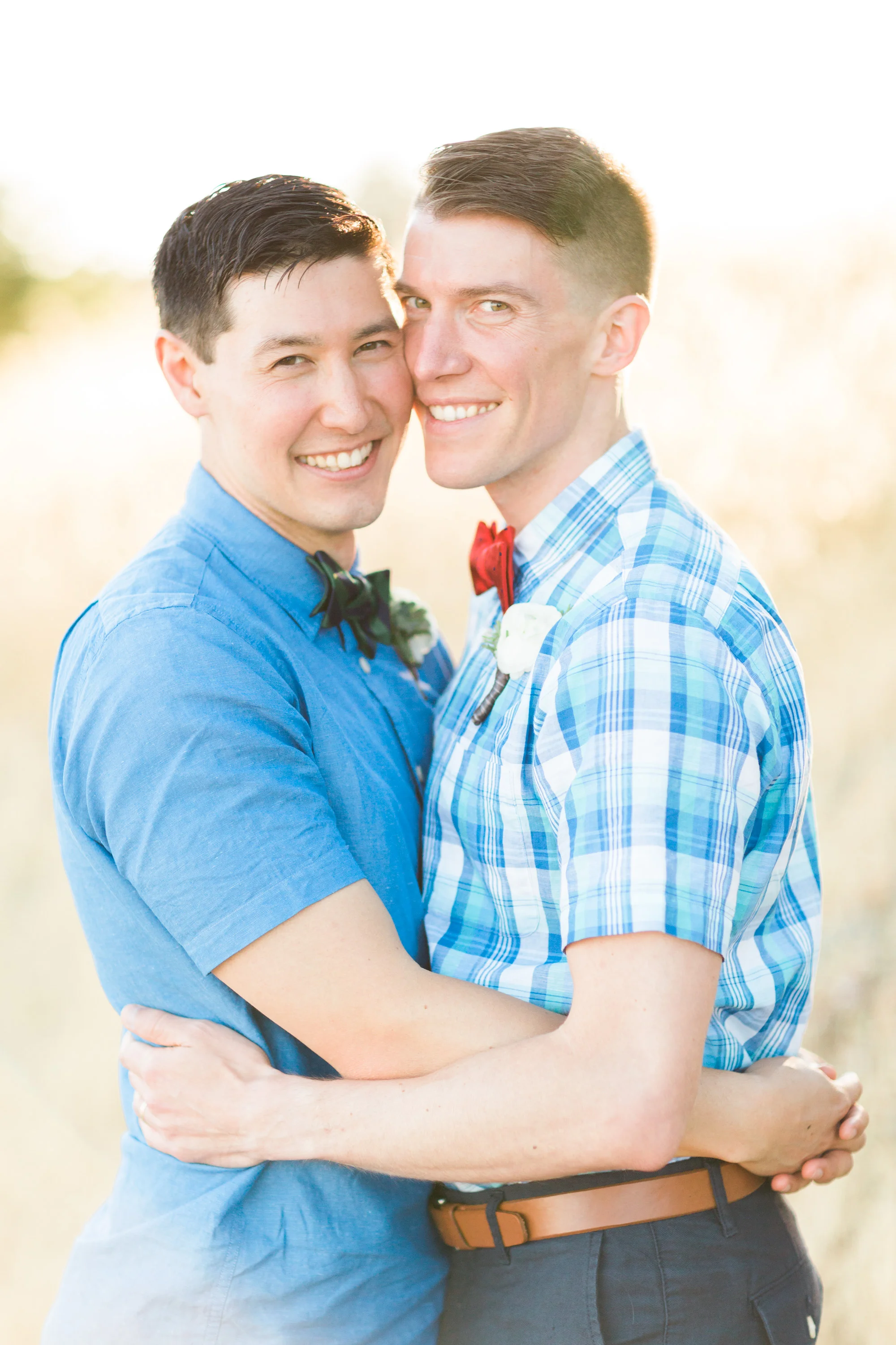 Smiling grooms on their wedding day