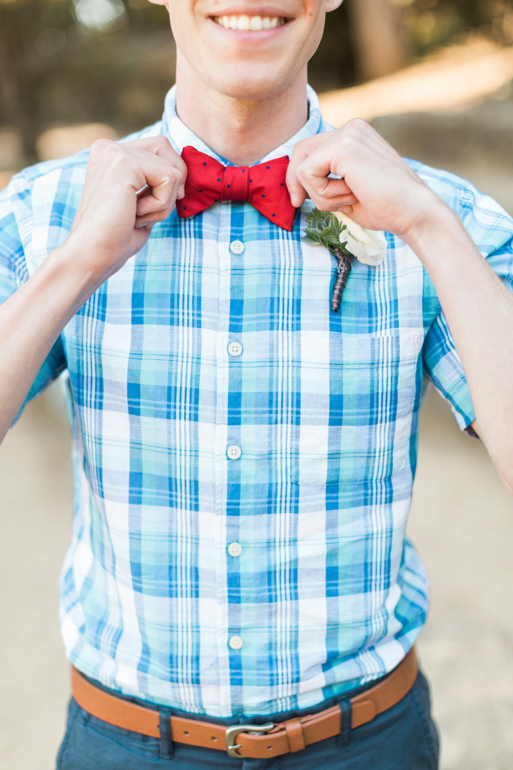 Groom straightening bowtie