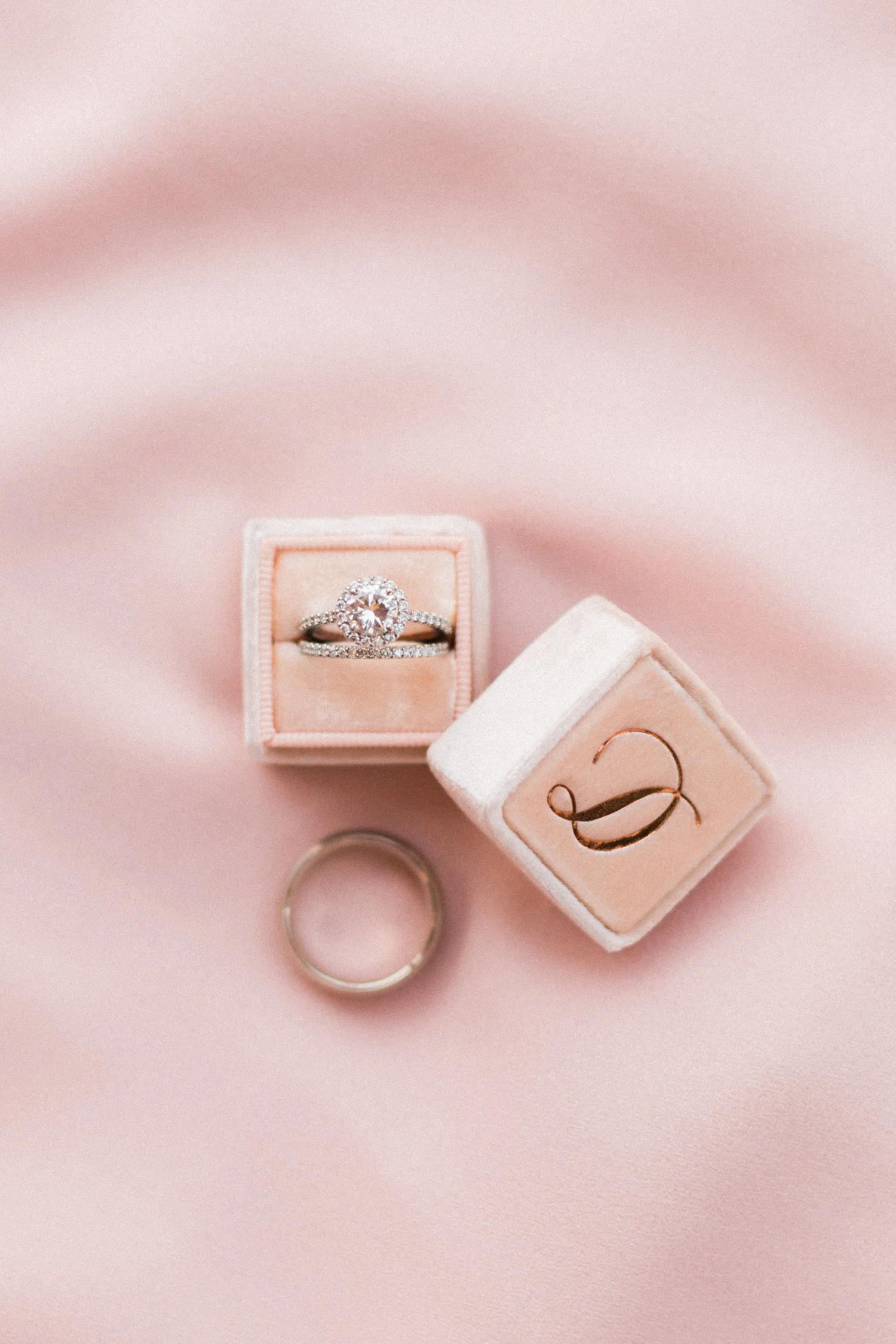Stunning halo ring with a blush Mrs. Box and copper foil monogram