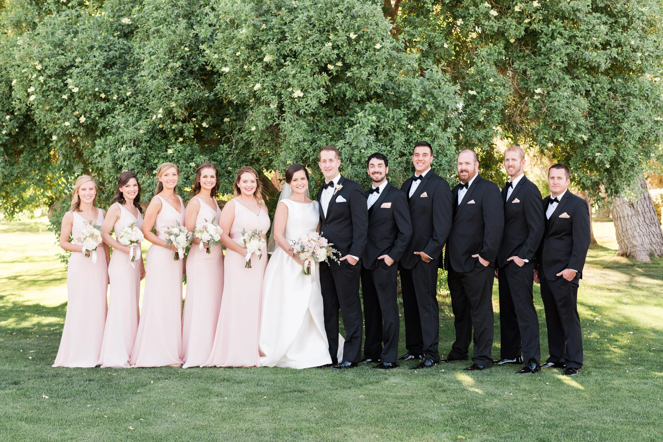 Wedding Party with bride & groom at the gorgeous green Tubac Golf Resort in Tubac, Arizona. Captured by best Tucson wedding photographers, Betsy & John 