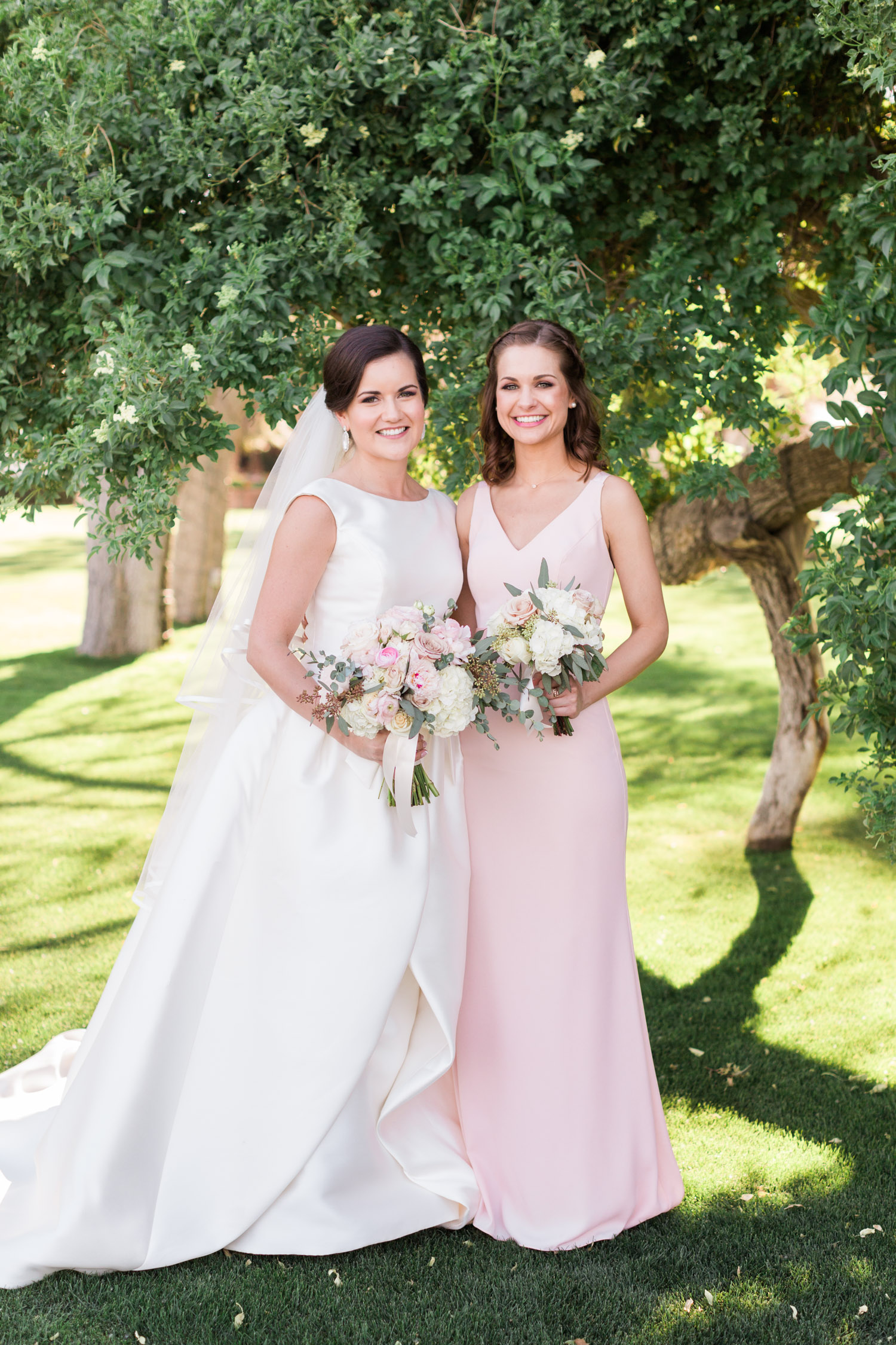Bride with Bridesmaid in blush