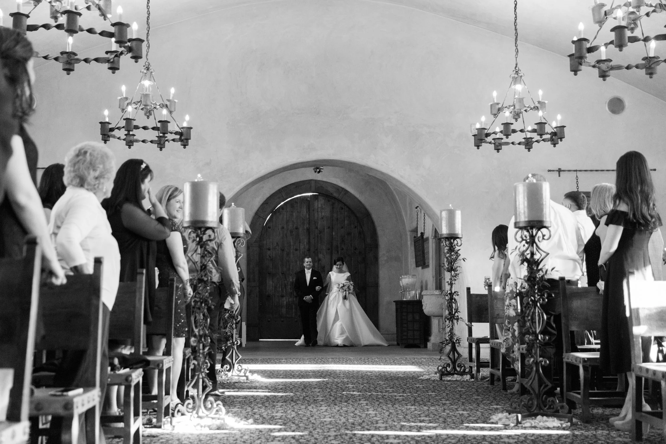 Father walking his daughter down the aisle in the gorgeous chapel at Tubac Golf Resort