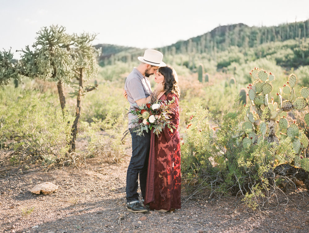  Couple standing in the desert about to kiss captured by Tucson Wedding Photographers, Betsy &amp; John&nbsp; 