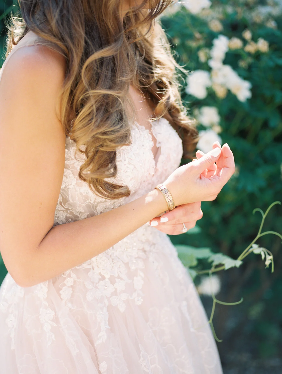 Bride wearing her grandmothers bracelet | Harrison & Jocelyne's gorgeous Temecula wedding at Wiens Family Cellars captured by Betsy & John Photography