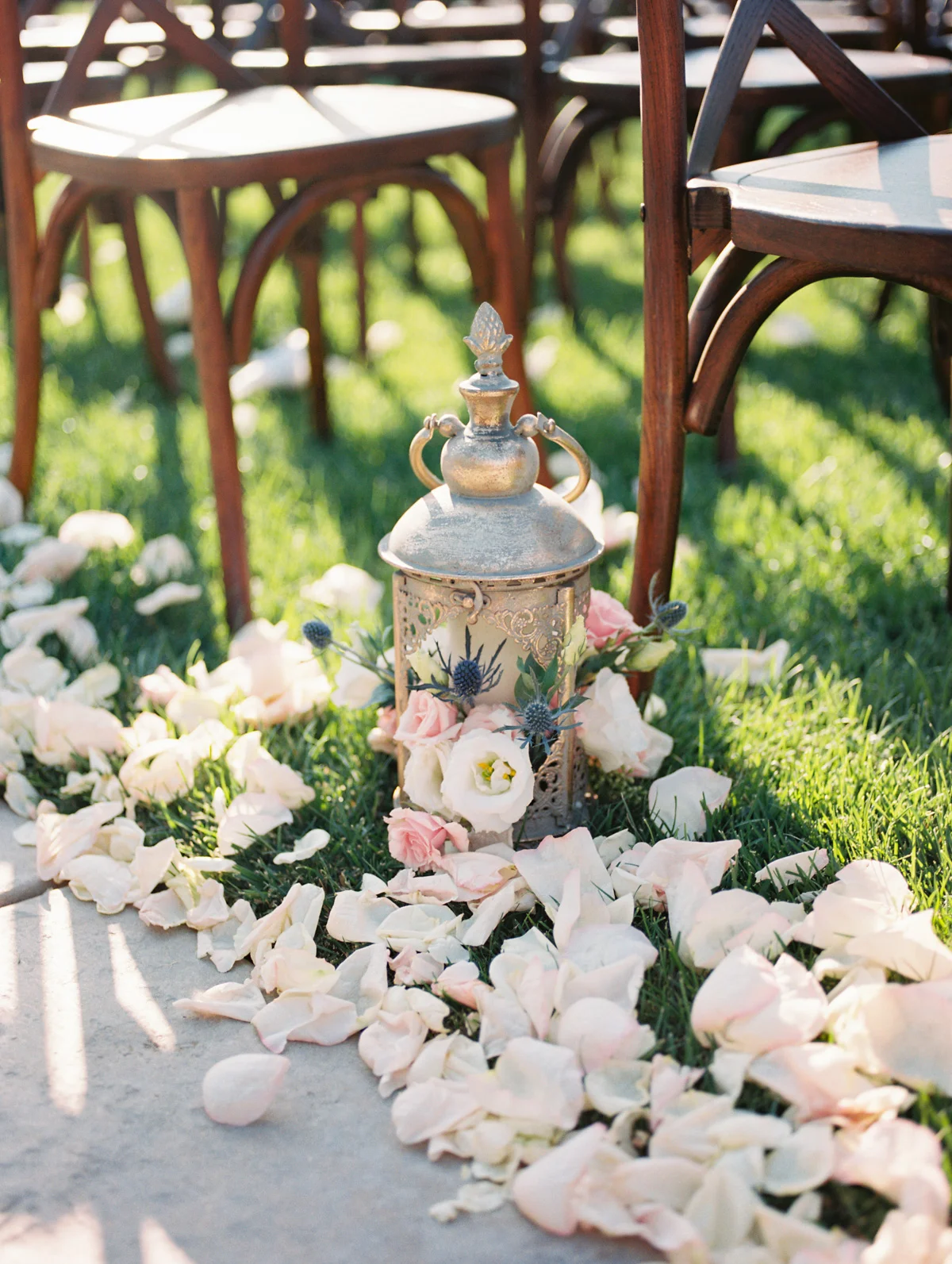 Aisle floral decorations by Soiree Design & Events | Harrison & Jocelyne's gorgeous Temecula wedding at Wiens Family Cellars captured by Betsy & John Photography | Temecula Film Photographers