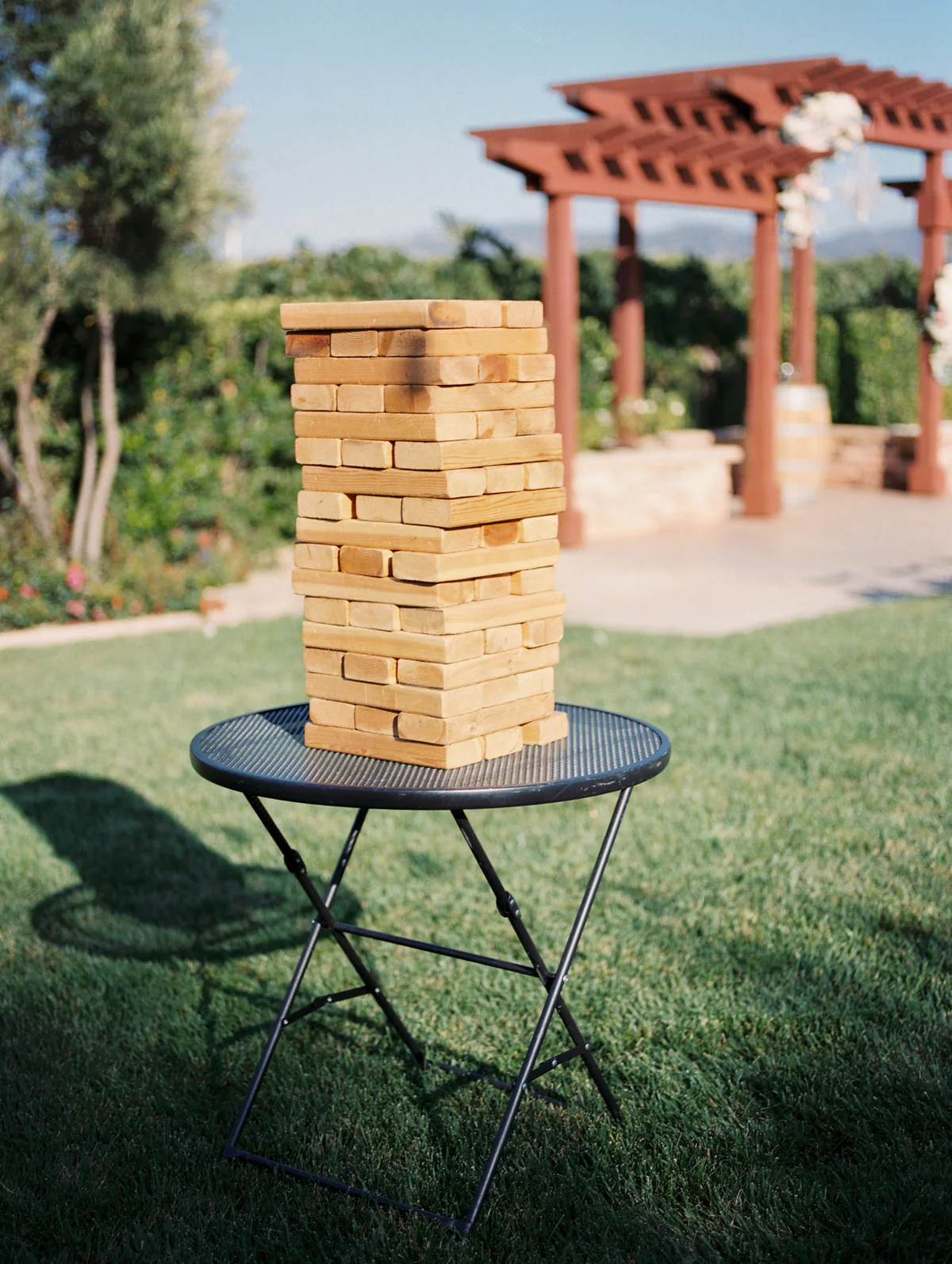 Lawn games during cocktail hour | Harrison & Jocelyne's gorgeous Temecula wedding day at Wiens Family Cellars captured by Temecula wedding photographers Betsy & John 
