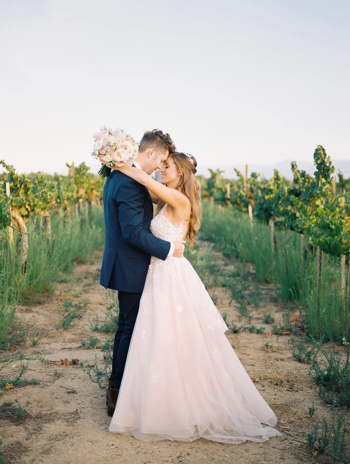 Harrison & Jocelyne's gorgeous Temecula wedding day at Wiens Family Cellars captured by Temecula wedding photographers Betsy & John