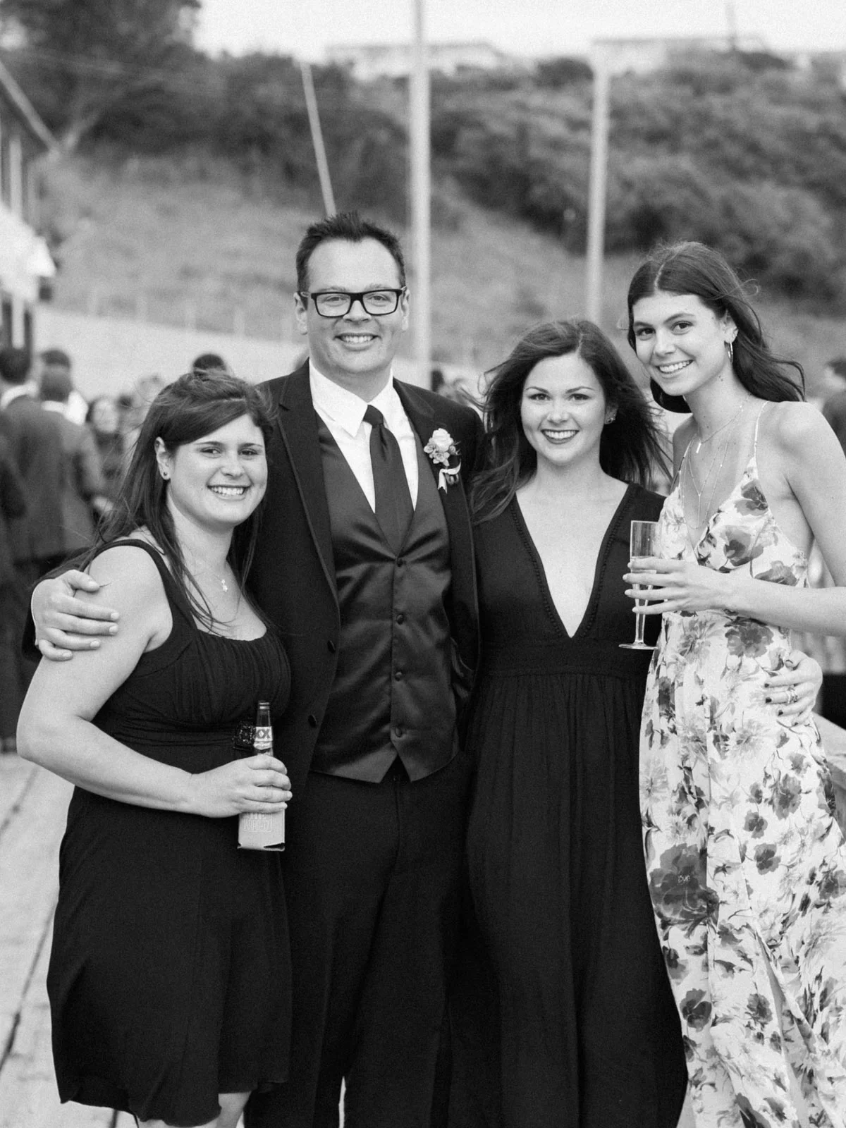 Gorgeous wedding in front of the Golden Gate Bridge at Presidio Yacht Club, captured by Bay Area Wedding Photographers Betsy & John