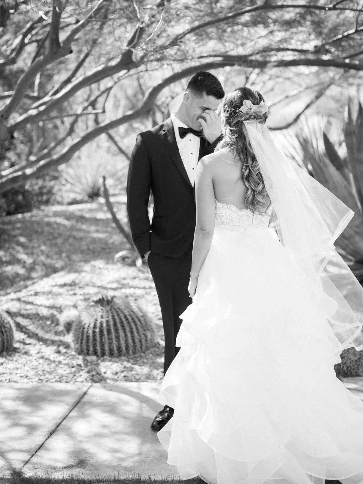 Perfect first look groom's reaction captured by Tucson Wedding Photographers Betsy & John 