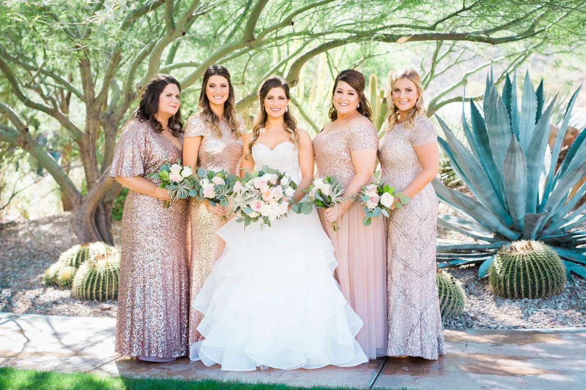 Sparkling blush bridesmaids gowns + blush and white bouquets captured by Tucson Wedding Photographers Betsy & John 