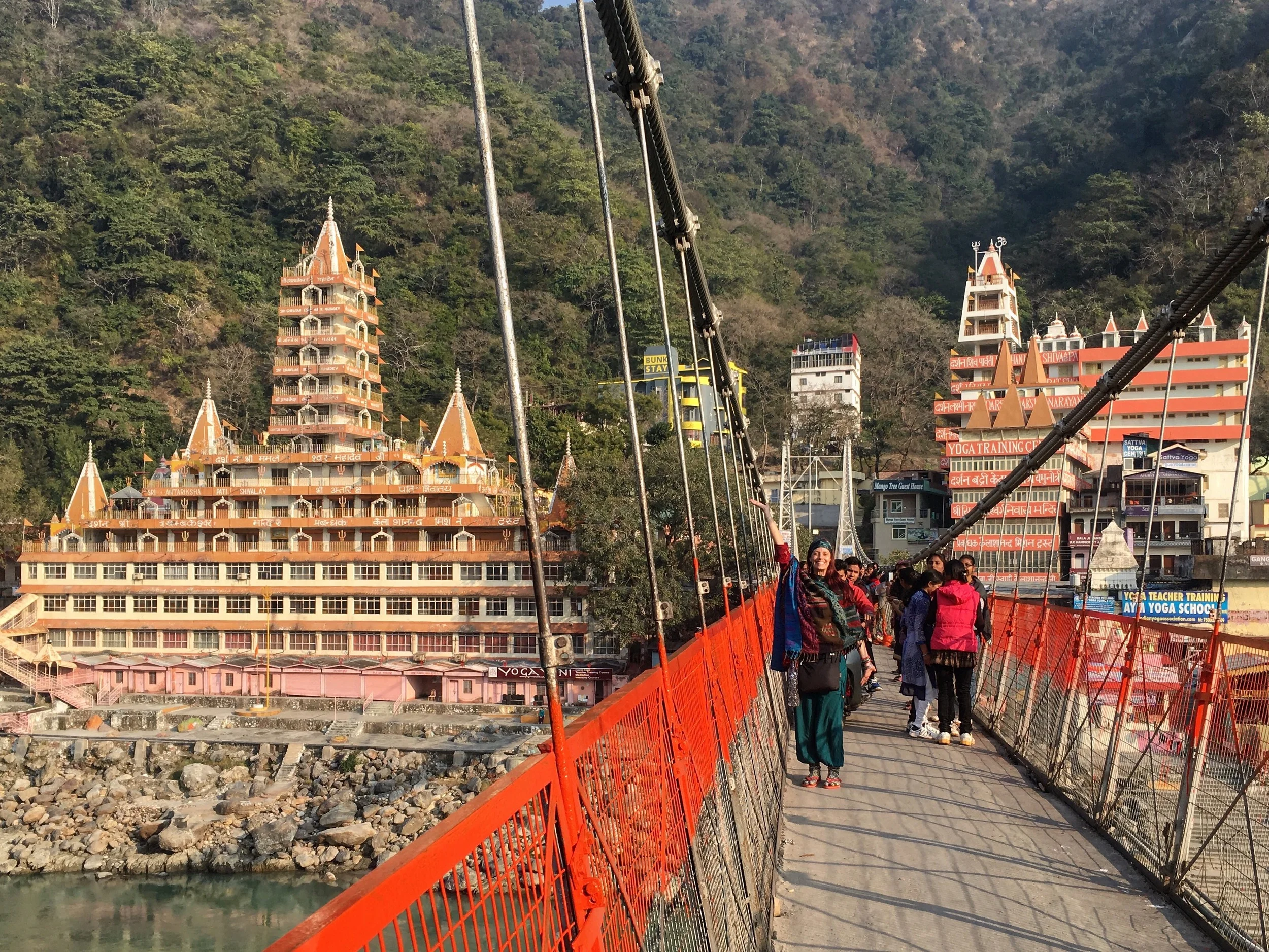 Crossing the Laxman Jhula bridge in Rishikesh, India.