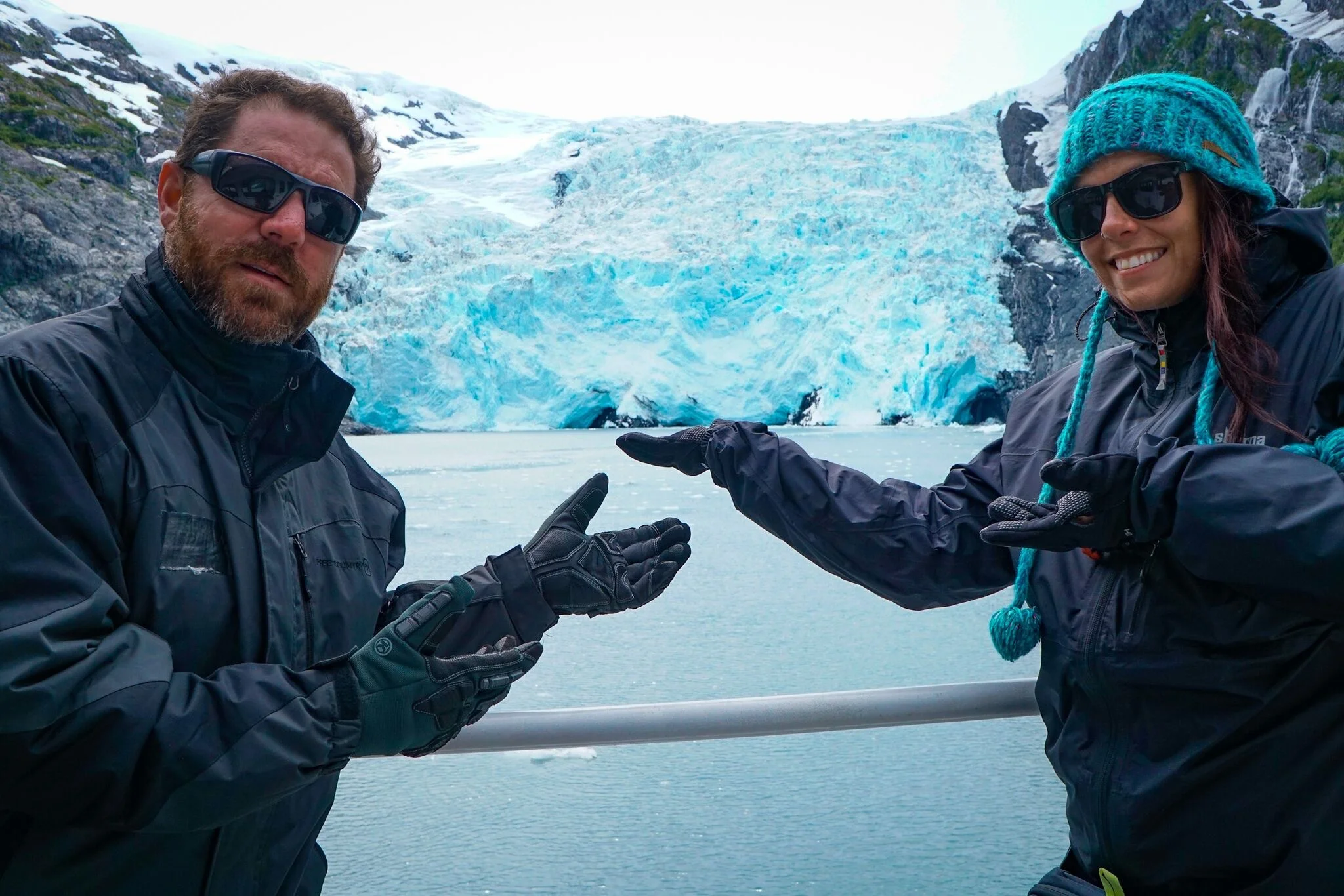 Nick and I doing our best Vanna White impression to showcase the glacier while waiting to see it calve into the water.