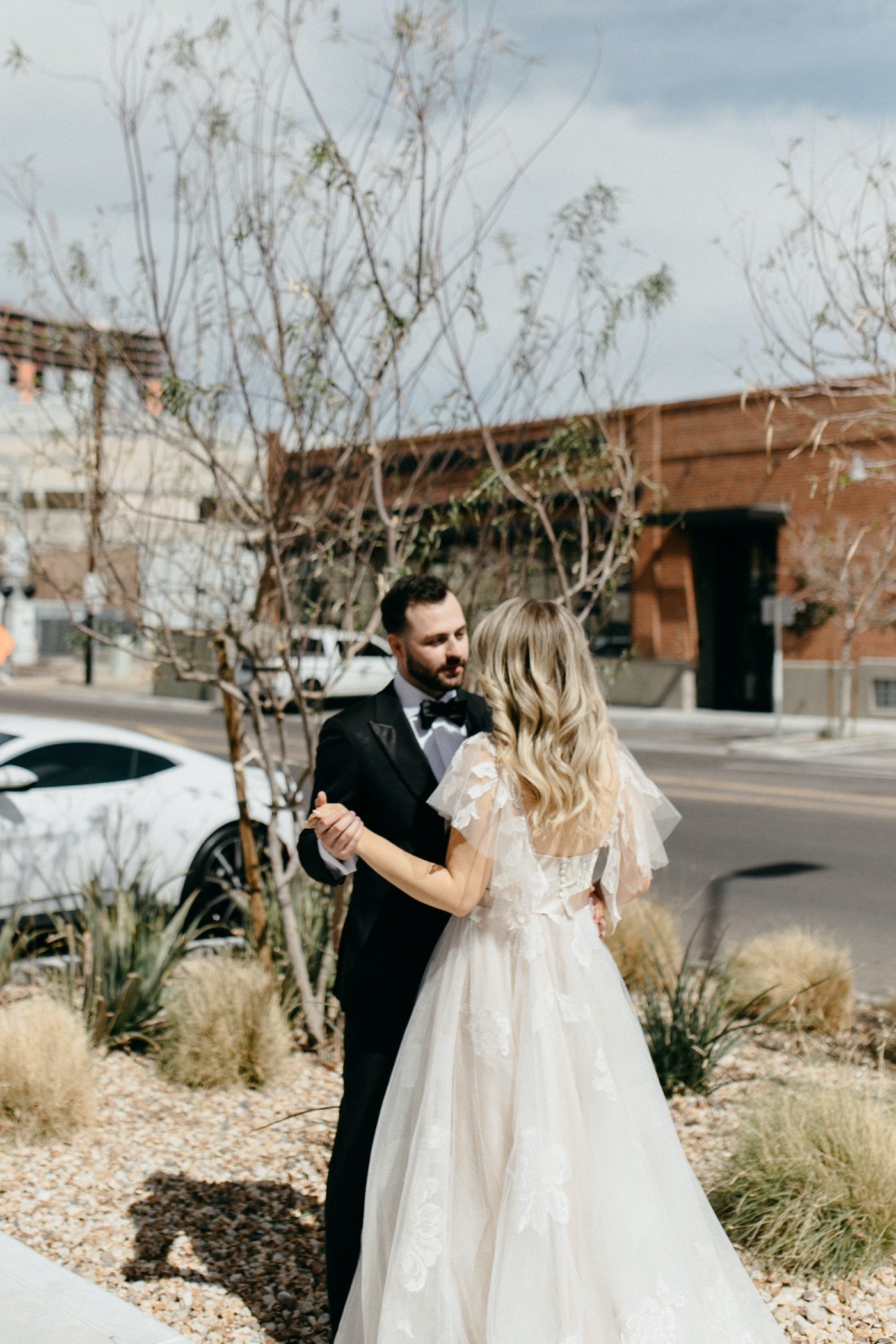 048_Opris Wedding-532_downtown phoenix white wall wedding portraits.jpg