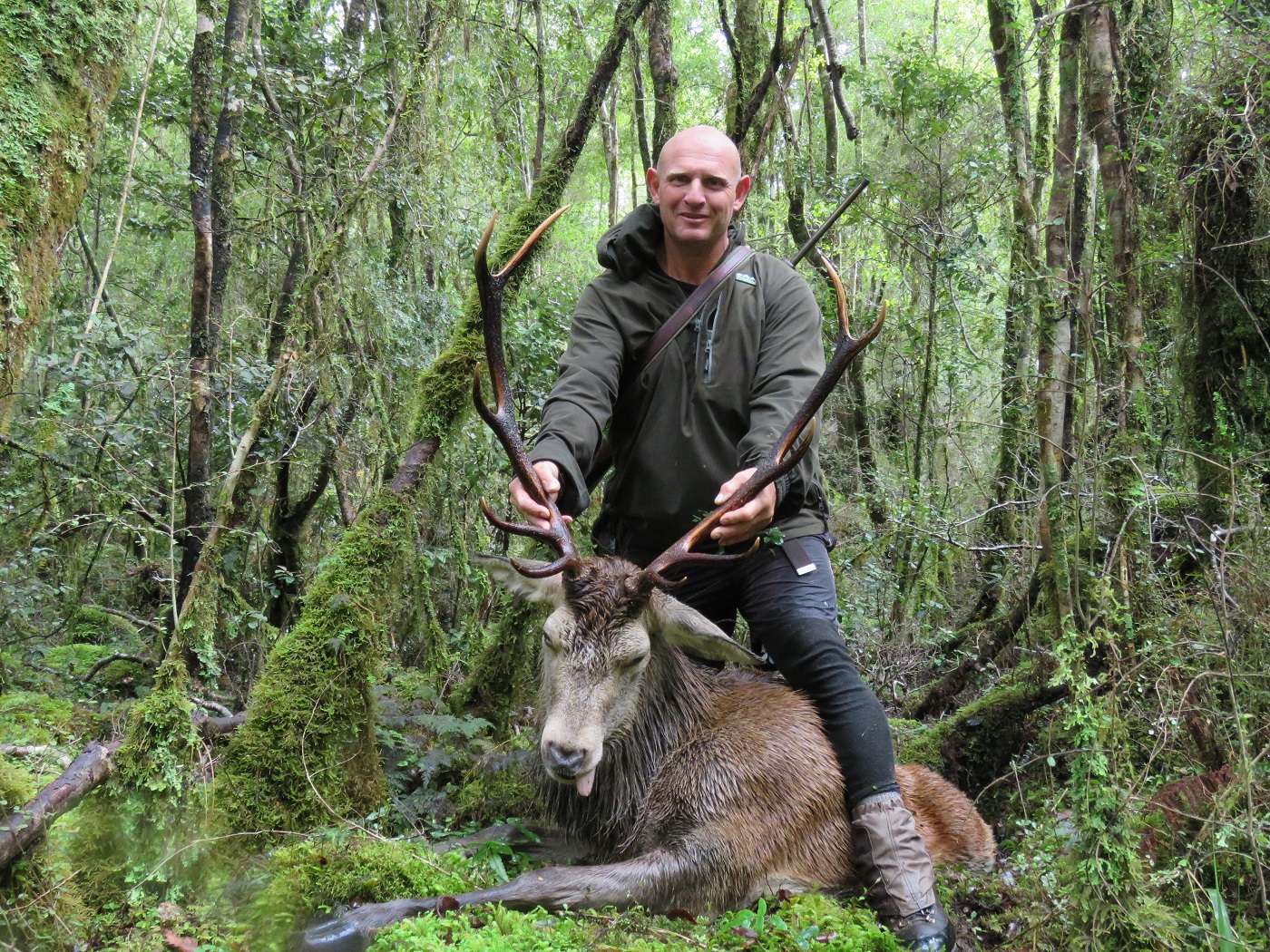   Colin Denison happy as with his bush 10 after a mammoth effort to get to him  