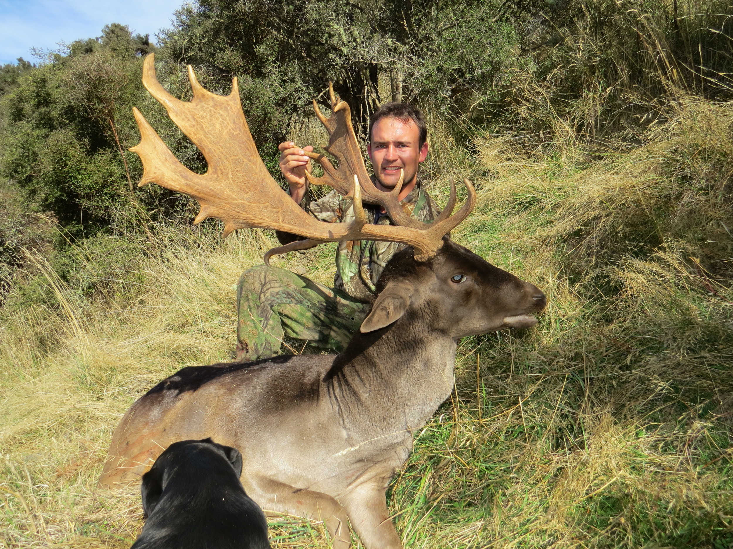 Richie Williams was the lucky one that got to take the shot to score himself a wicked fallow buck - Photo by Ryan Carr