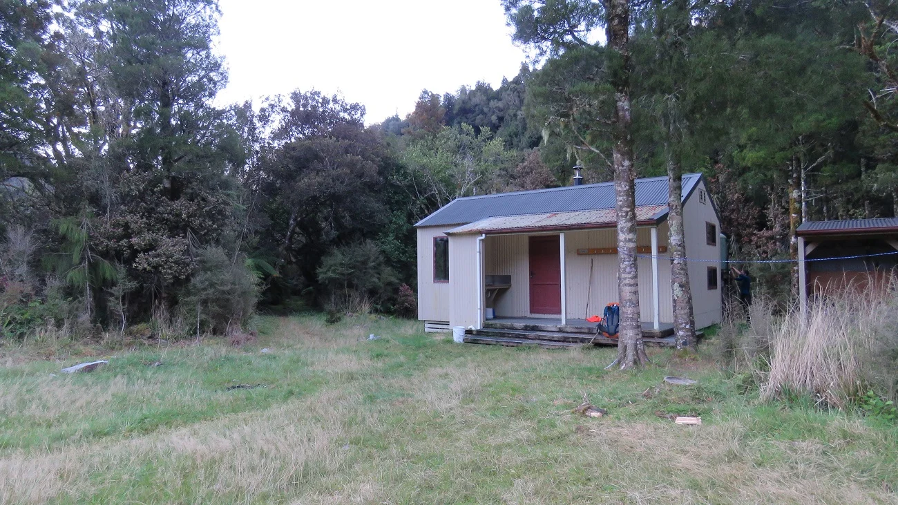 Frew Hut is a flash hut, with a good log burner, large table and benches, tap water and sleeps about 12. It took us about 8 hours from Cropp Spur to Frews Hut, slowed down by stag encounters and fresh slips.