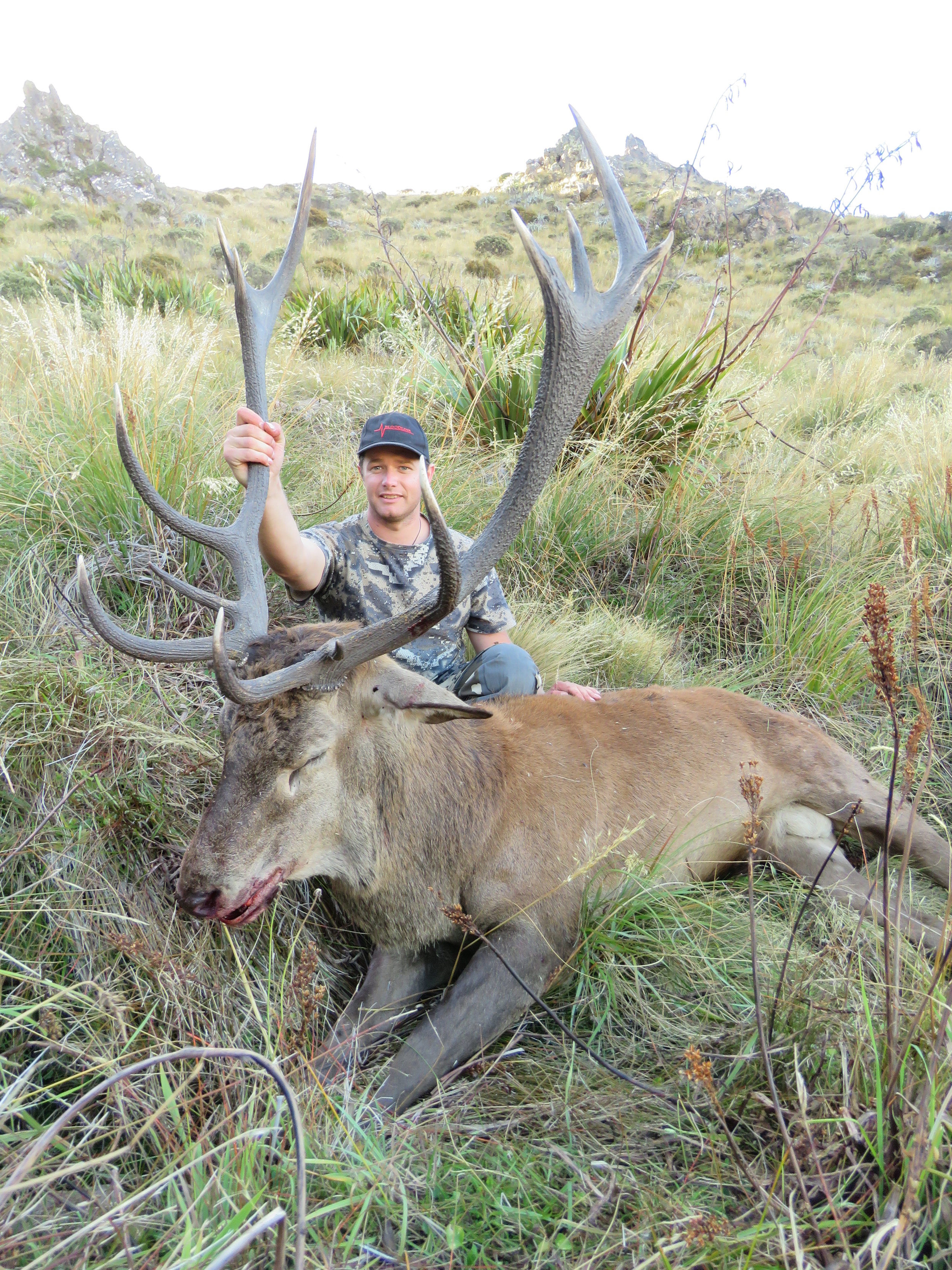  Chris Rouse with a cracker on an old stag. Image @ Jarrod Mclauchan 