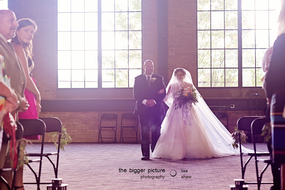 walking down the aisle The Bigger Picture Photography