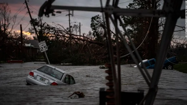 Floodwaters overwhelm vehicles in Panama City on Wednesday, October 10, 2018. Photo from CNN https://www.cnn.com/2018/10/11/us/hurricane-michael-tropical-storm-wxc/index.html