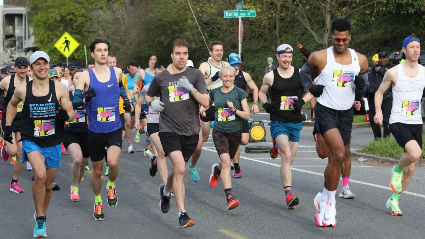 Runners racing during the Tenacious 10 around Lake Union in Seattle