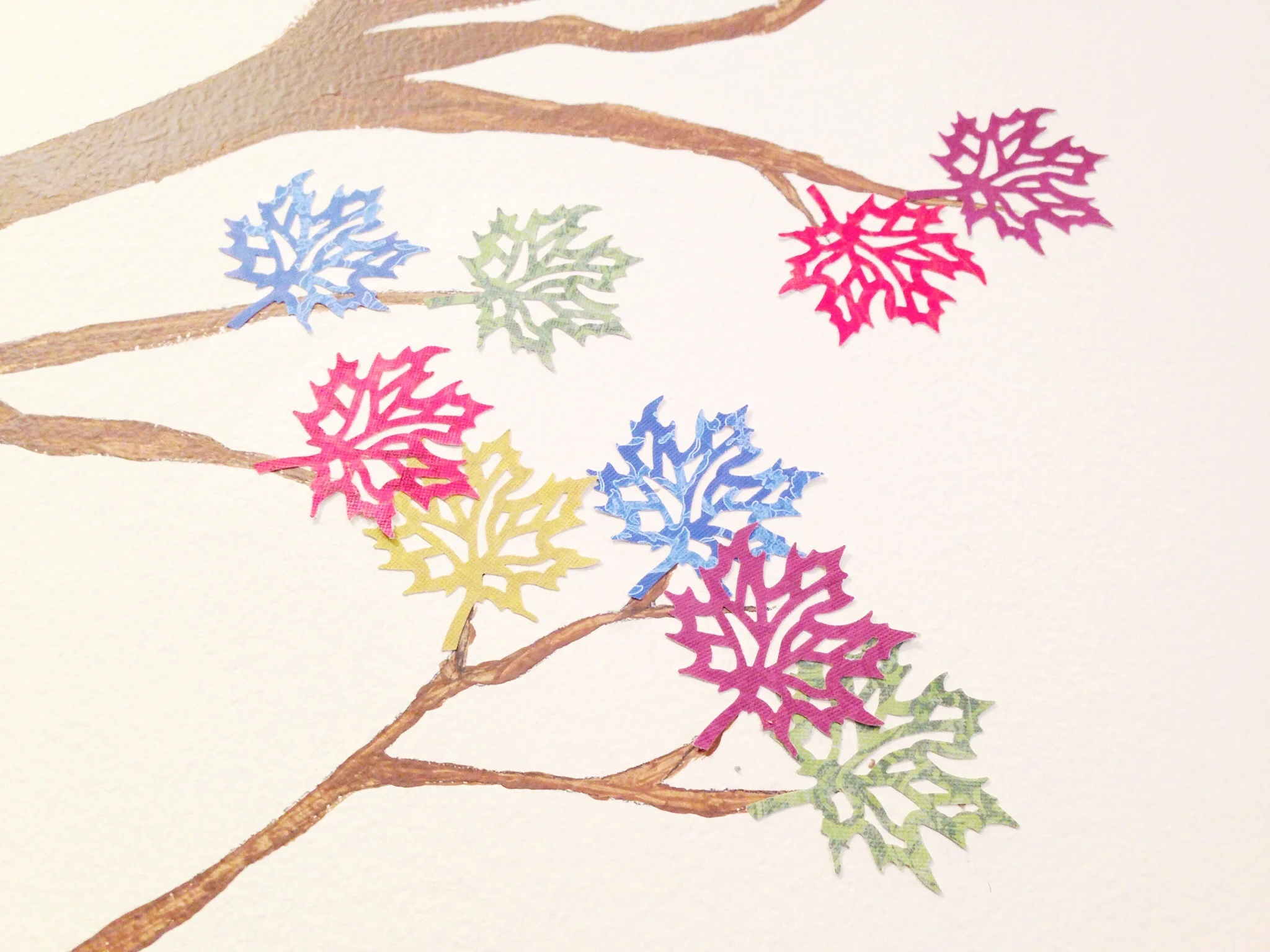  ...then I used a paper punch for the leaves and painted them on with glue. 