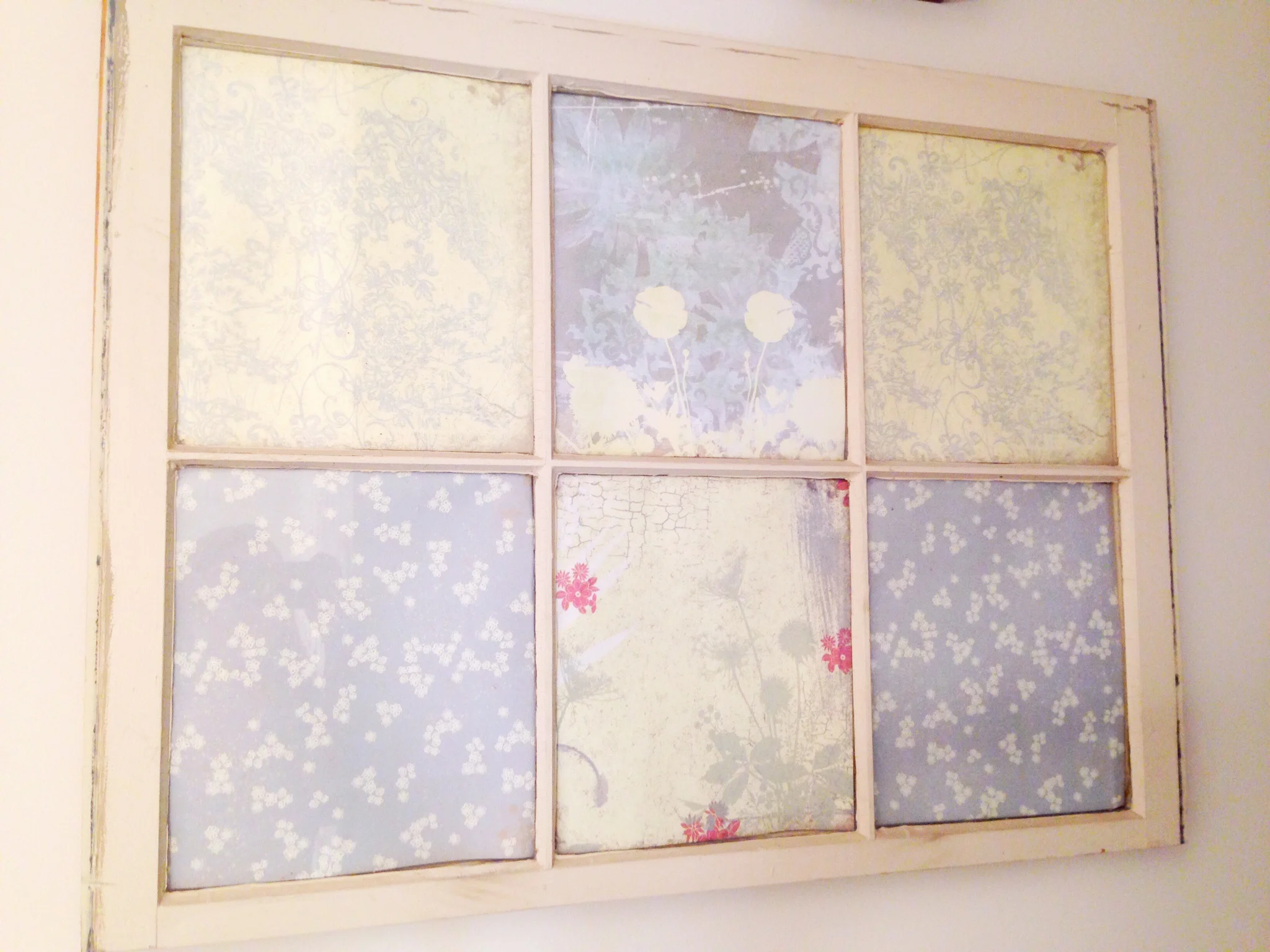  This now serves as decoration only, but this window pane used to act as a dry erase board. 