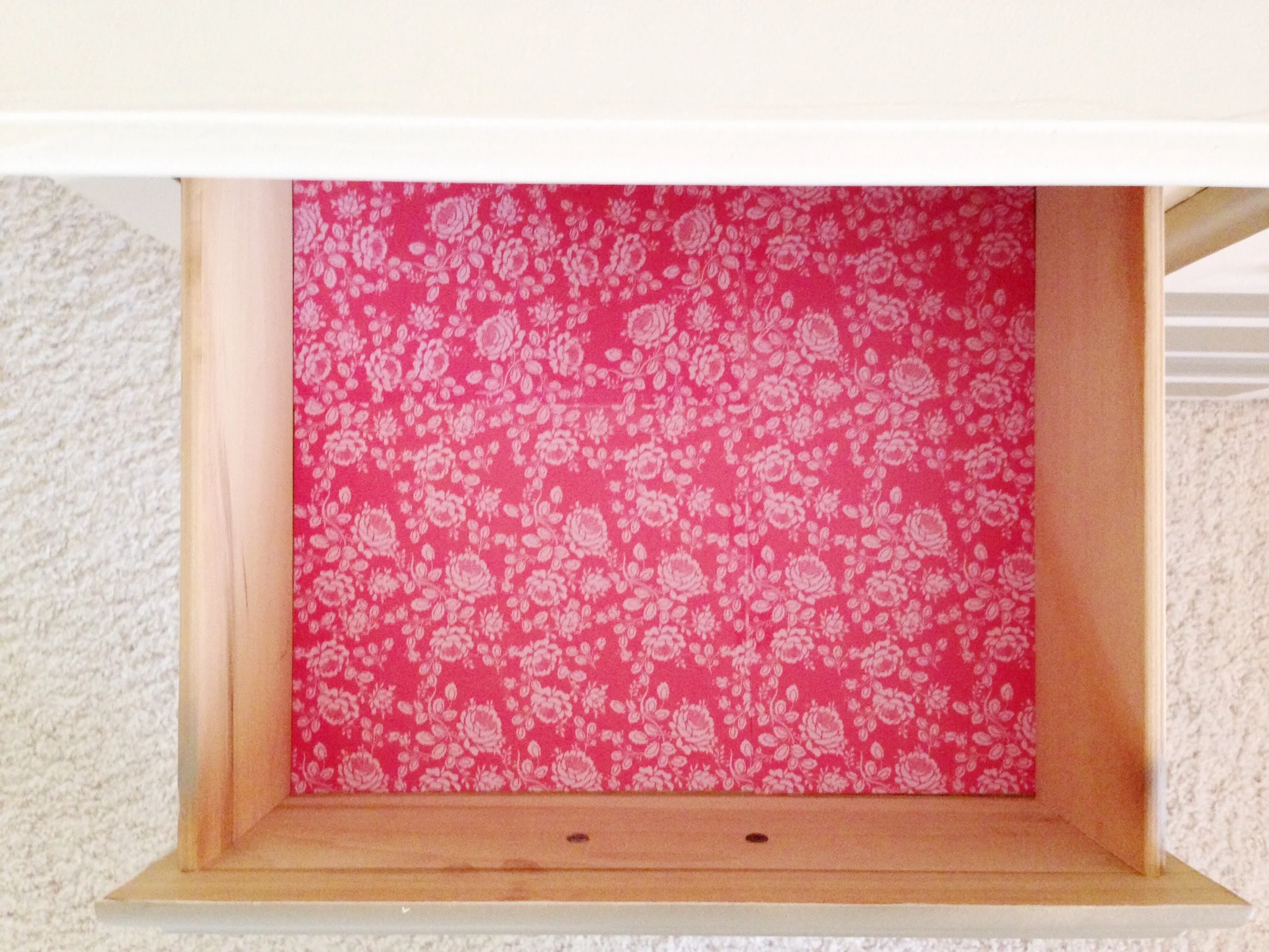  Line drawers with it. It's thick and won't roll up. 