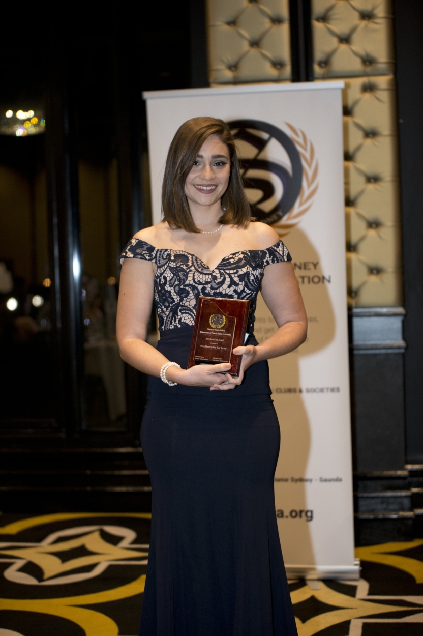 NDSLS President Elyse Di Stefano accepting the award on behalf of the NDSLS.