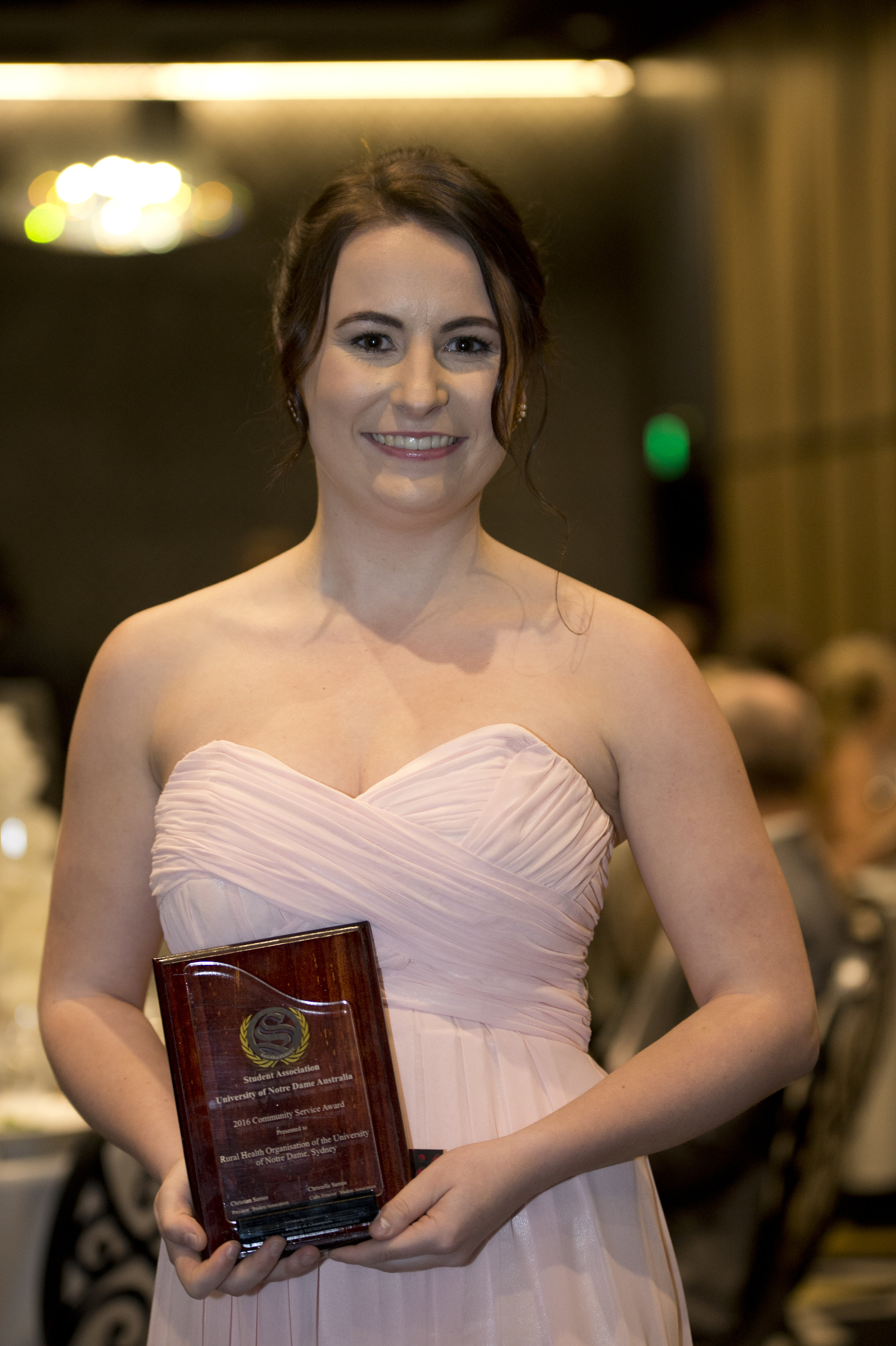 ROUNDS Nursing Representative accepting the Community Service Award on behalf of ROUNDS.