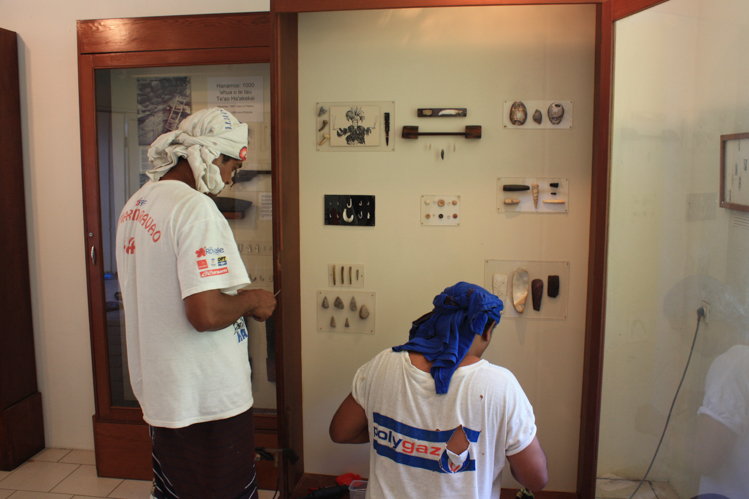 2013. Samuel Tiaiho and Hio Timau mounting the "Treasures of Tahuata" exhibit. (Copy)