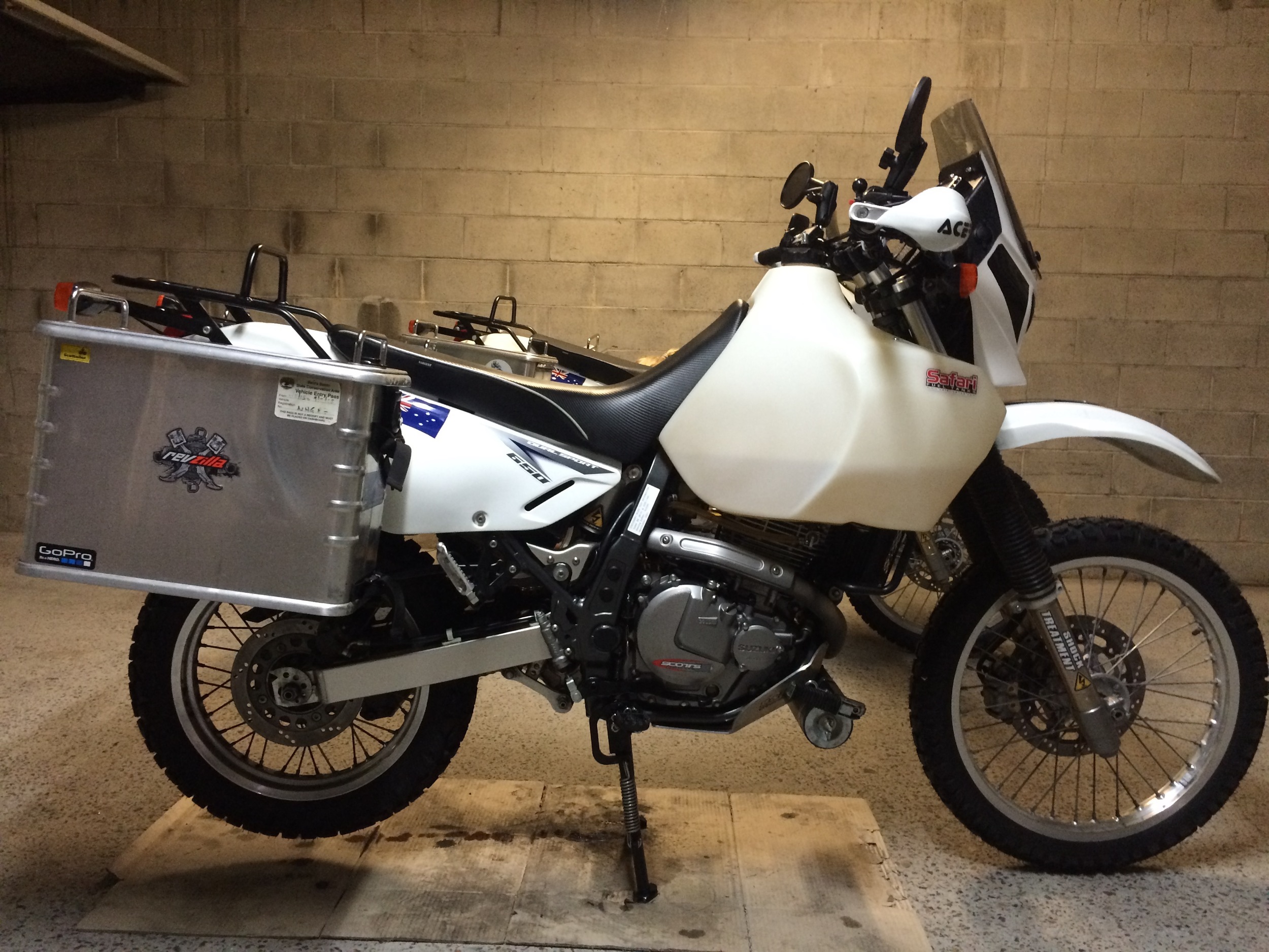 Note: Our bikes are lowered (using the Suzuki factory method), so the wheel is raised slightly further off the ground than if your bike is the standard height. However this also makes the bike harder to get up onto the stand.