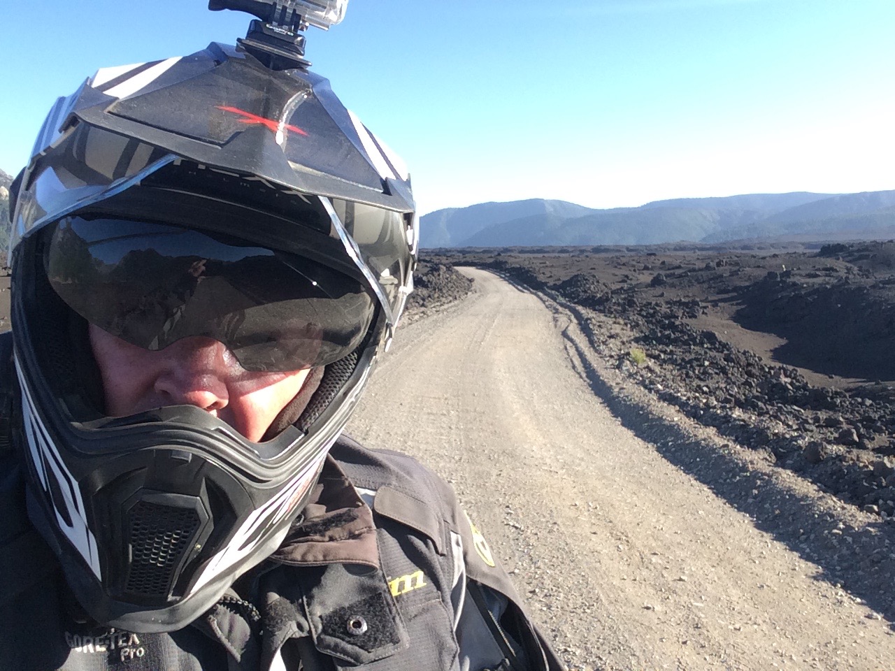 Conguillio National Park, Chile. Riding through the Volcanic sand.