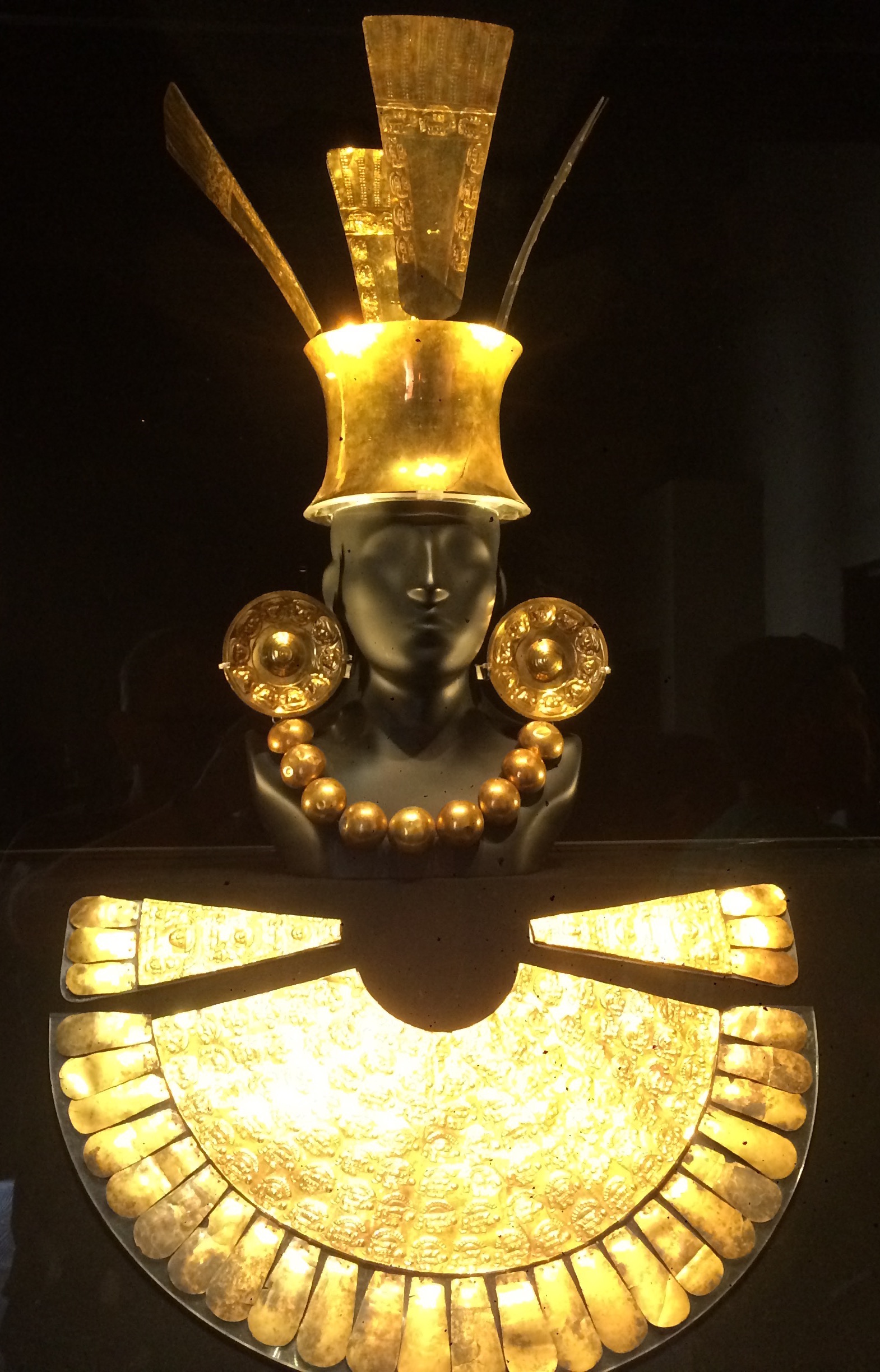 By far the most visually impressive piece is this gold funerary offering from the Chimu culture.